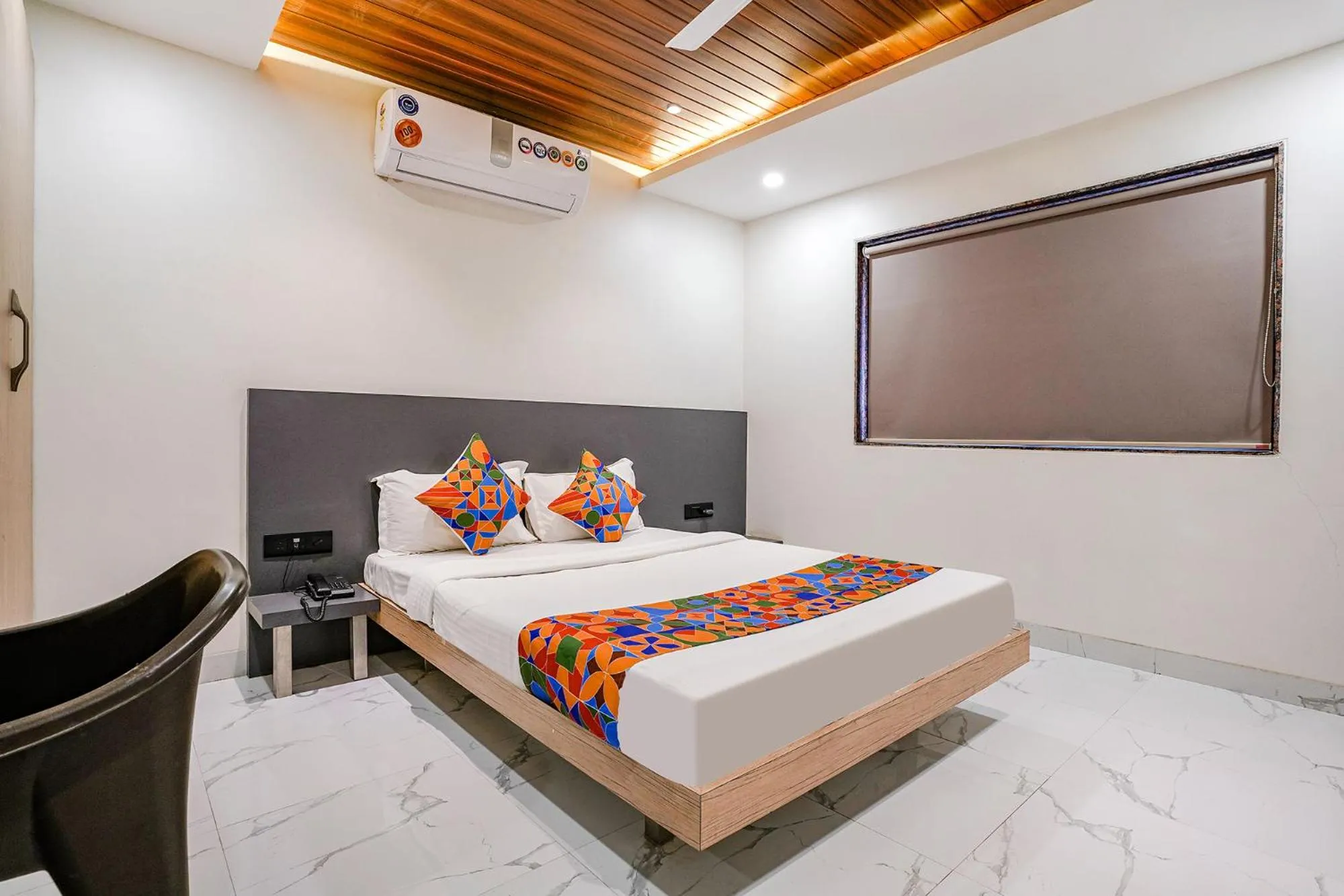 Bed in FabHotel Ansh