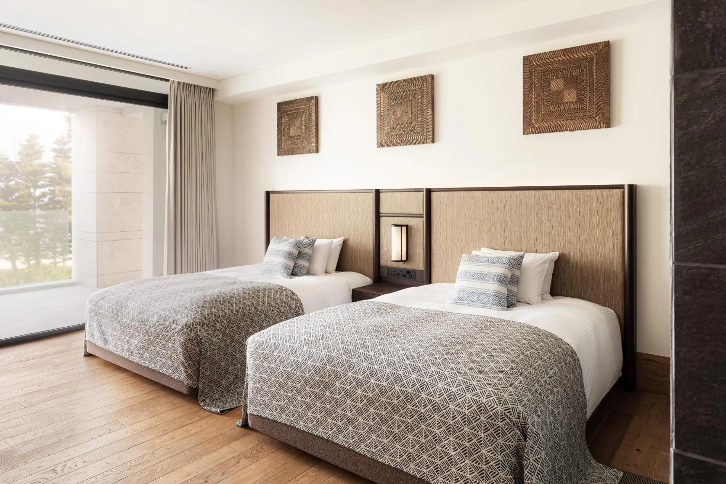 Bed in UMITO Okinawa Onnason