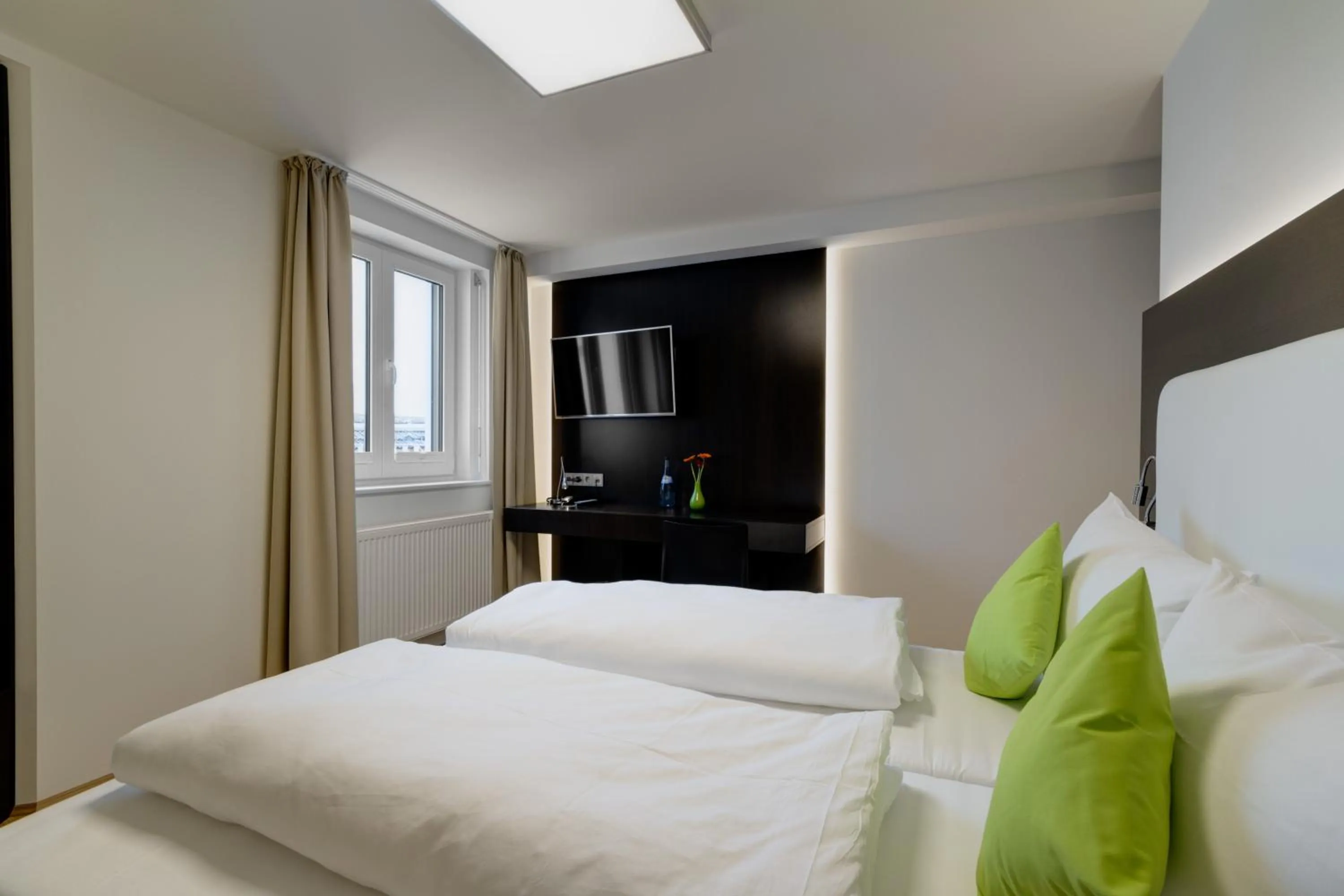 Bedroom, Bed in sevenDays Hotel BoardingHouse Mannheim