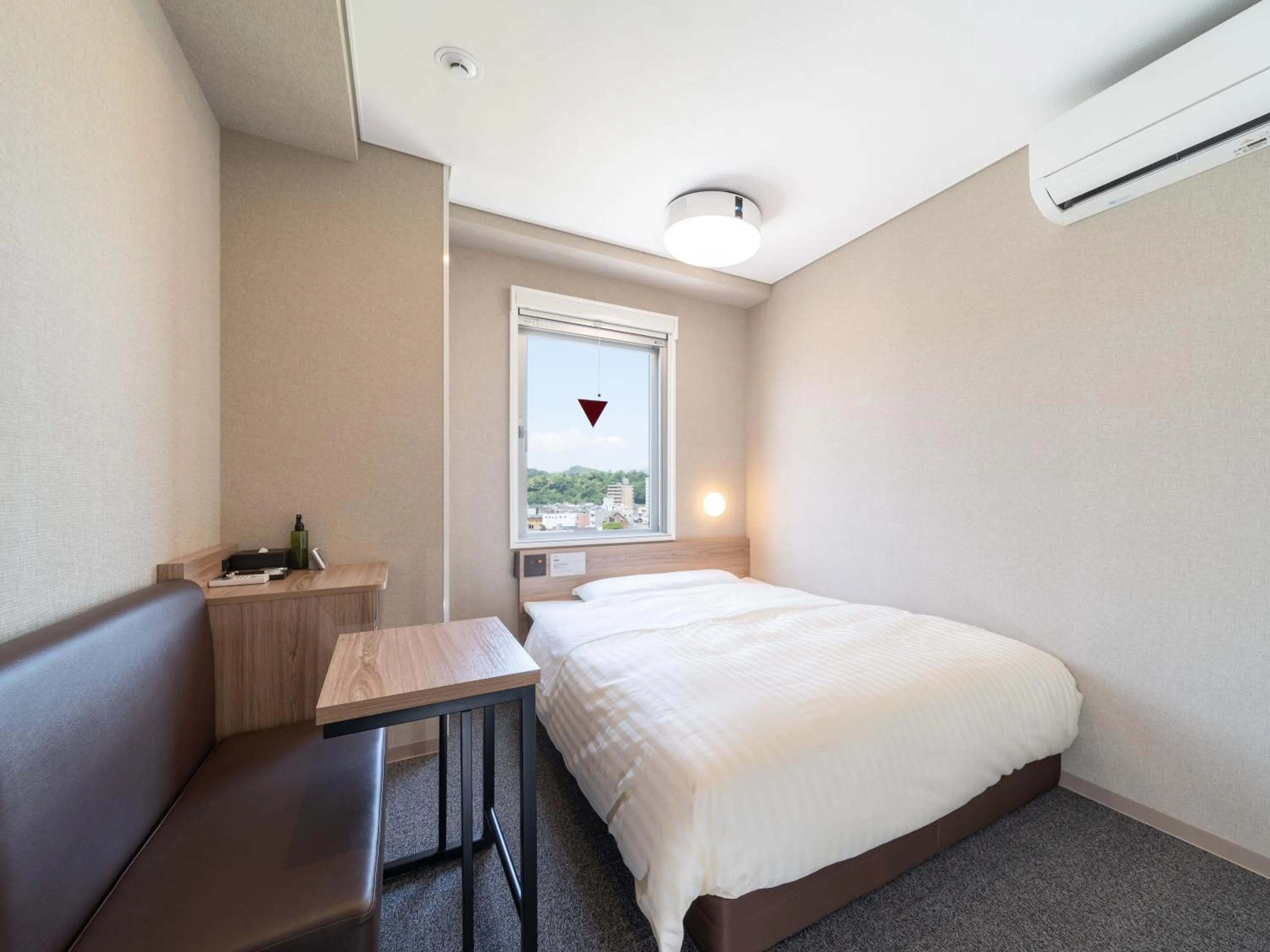 Bed in Super Hotel Higashi-Maizuru