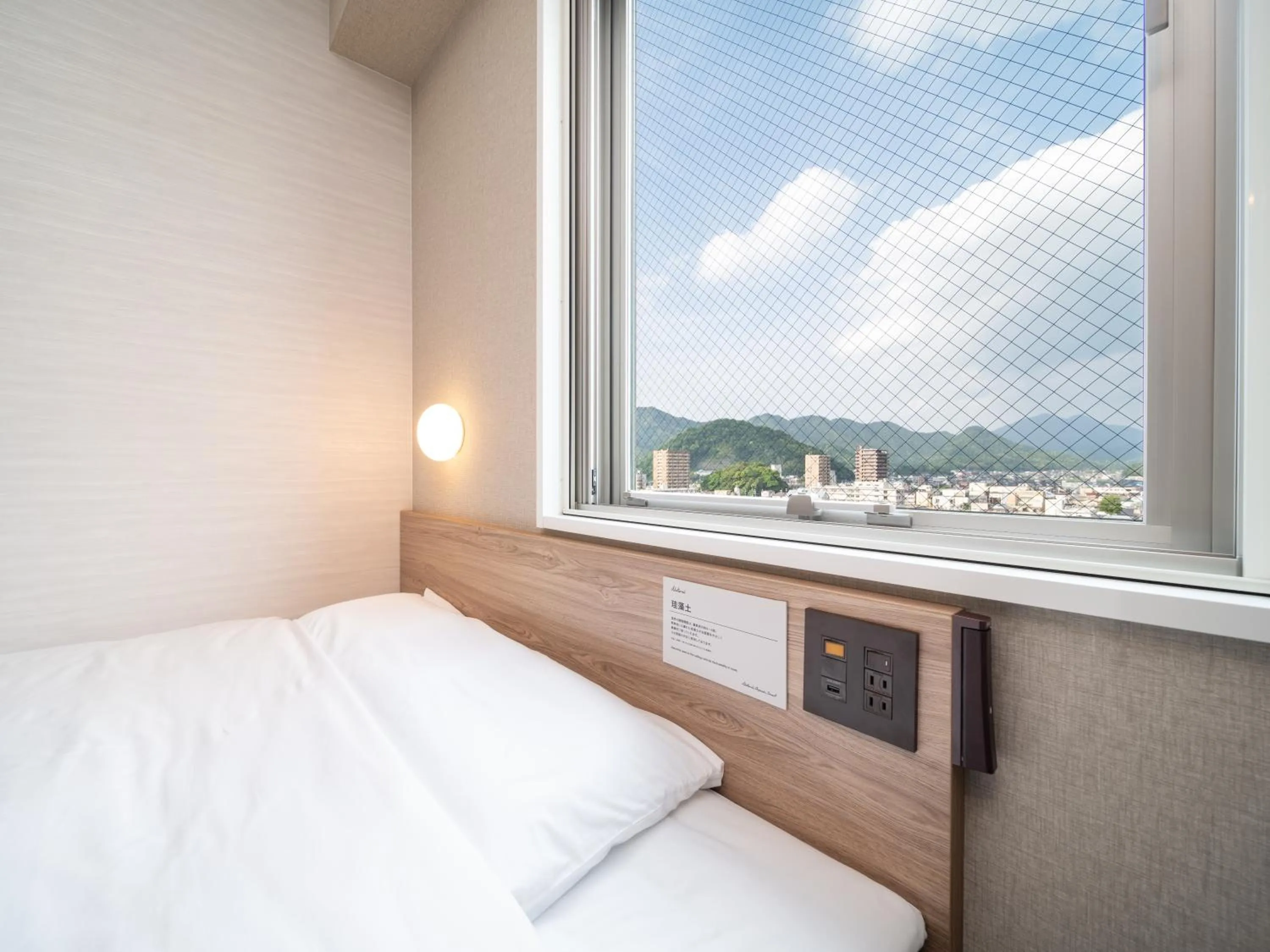 Bed in Super Hotel Higashi-Maizuru