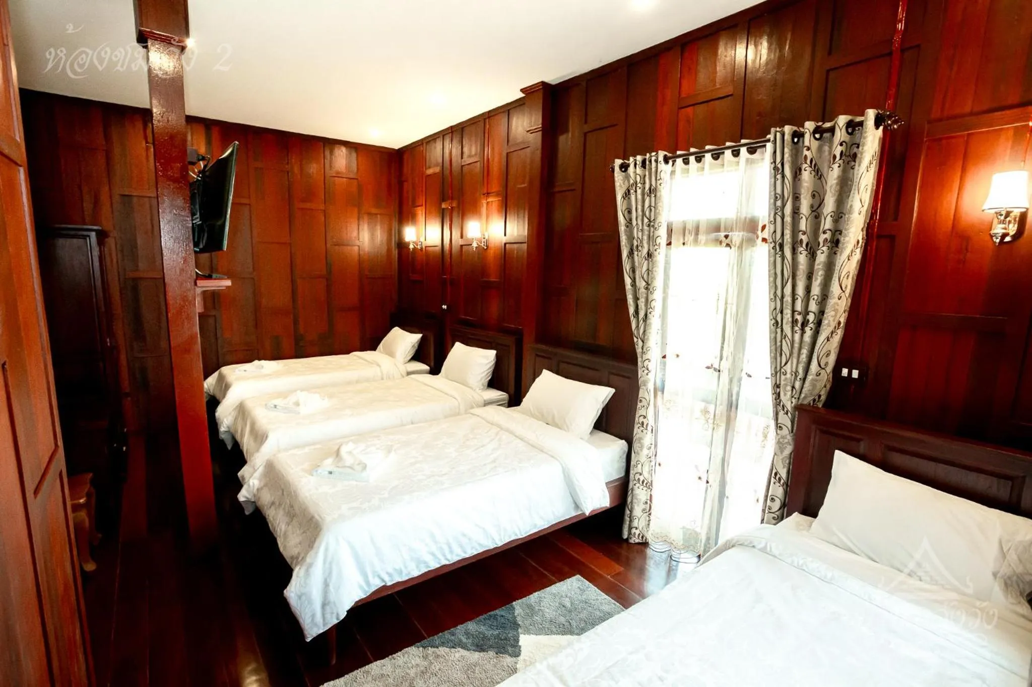 Bed in Baan Lhang Wangh บ้านหลังวัง