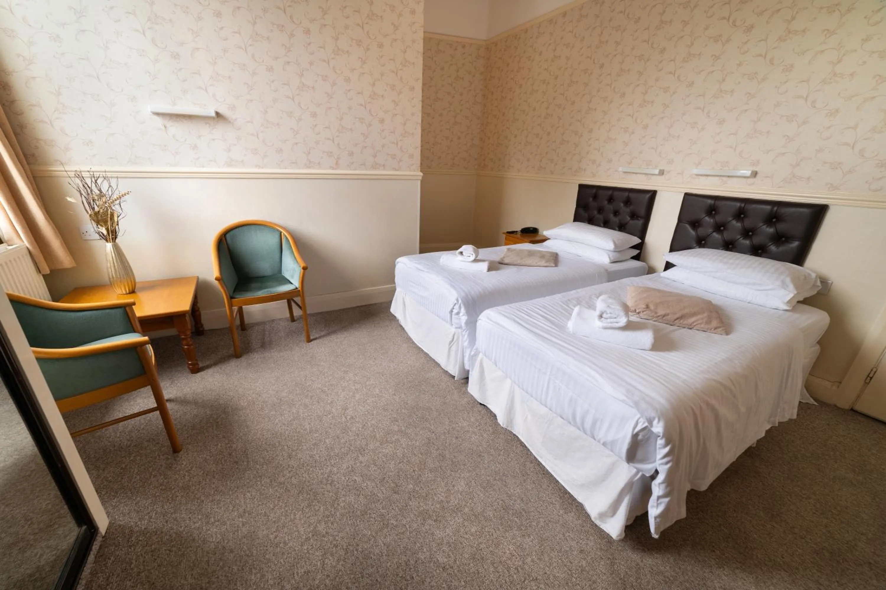 Bed in Devonshire Hotel