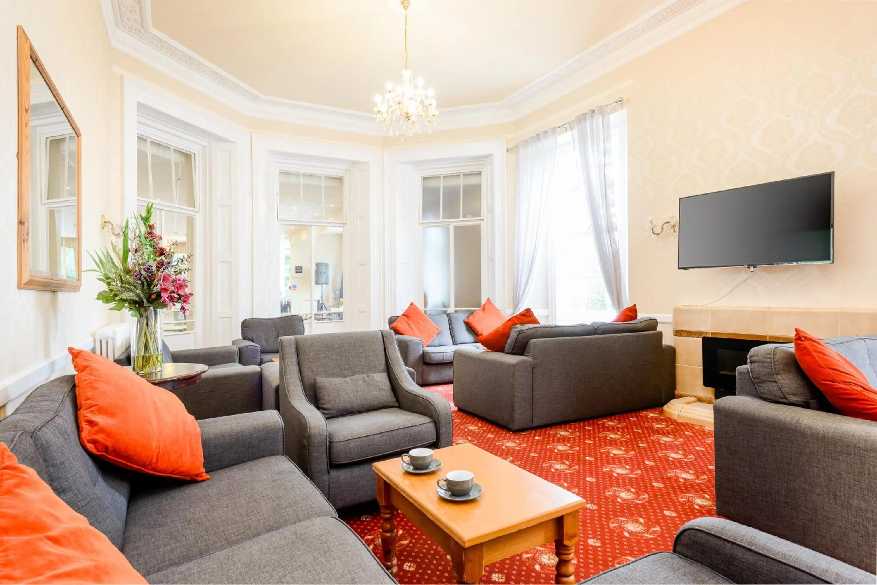 Communal lounge/ TV room in Devonshire Hotel