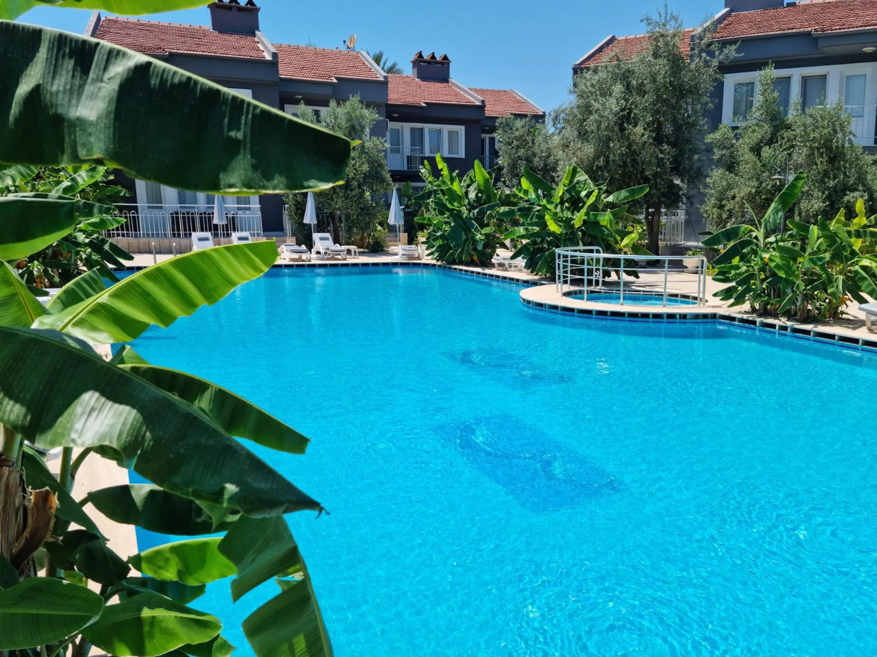 Swimming pool in ÖZCEM APART HOTEL FETHİYE