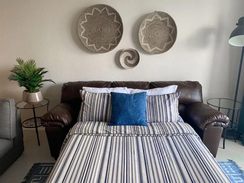 Bed in Beautiful Apartment Steps Away from the Beach