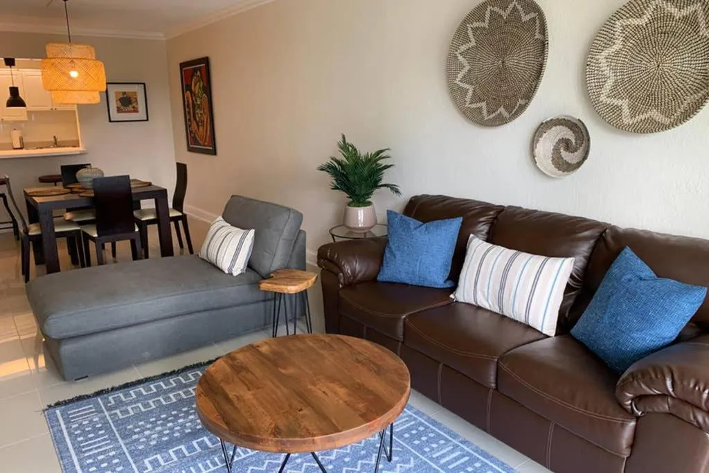 Living room in Beautiful Apartment Steps Away from the Beach