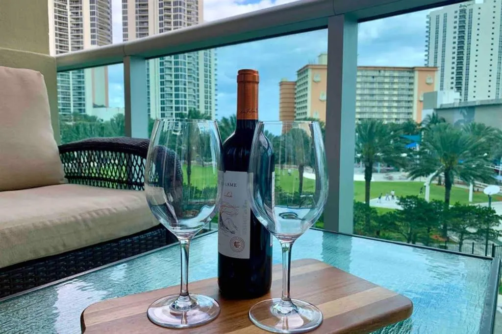 Balcony/Terrace in Beautiful Apartment Steps Away from the Beach