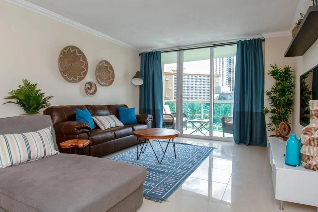Living room in Beautiful Apartment Steps Away from the Beach