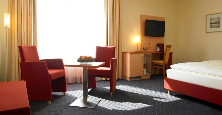 Photo of the whole room, Bed in Adler Hotel & Restaurant Groß-Gerau