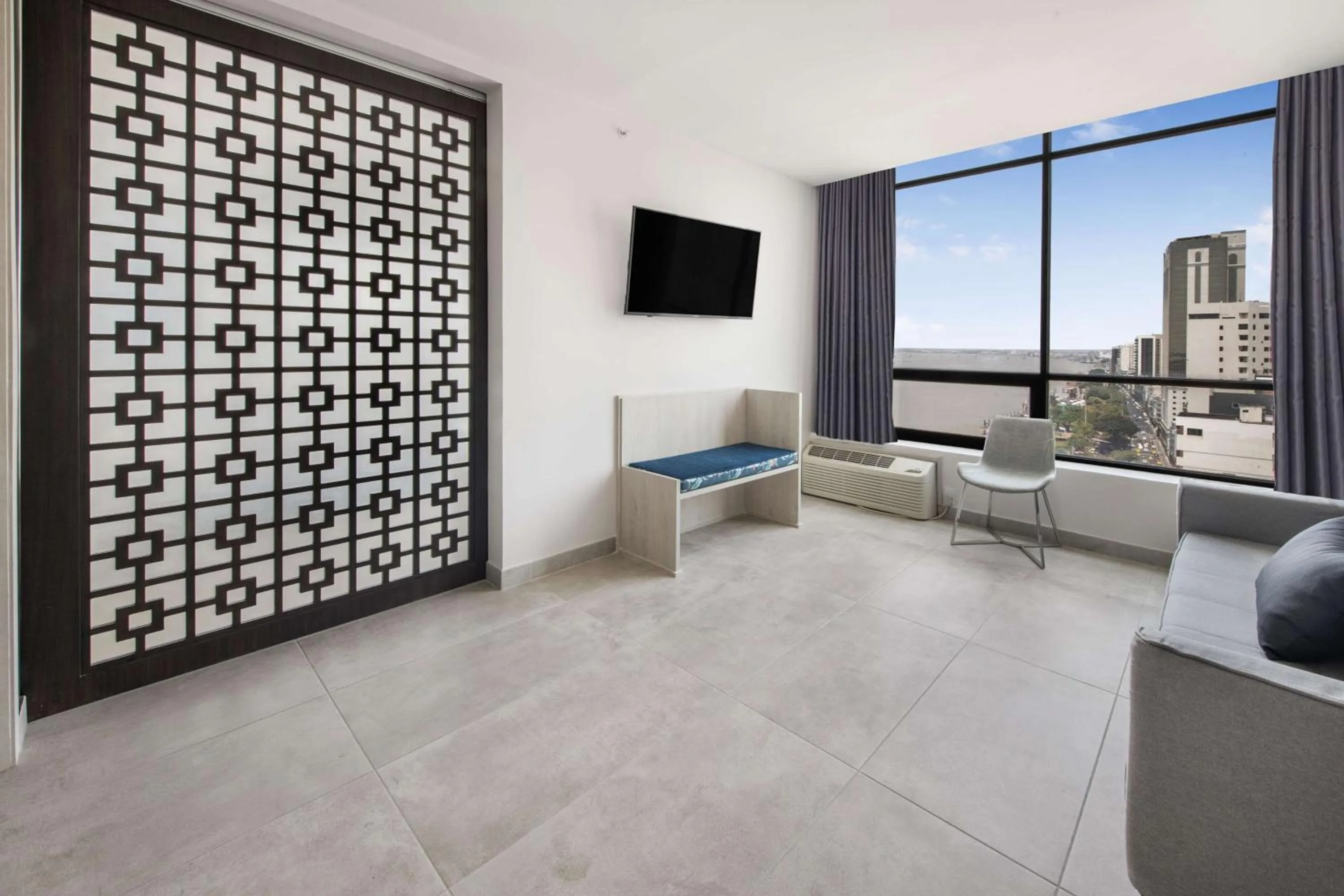 Living room in River Garden Hotel + Suites