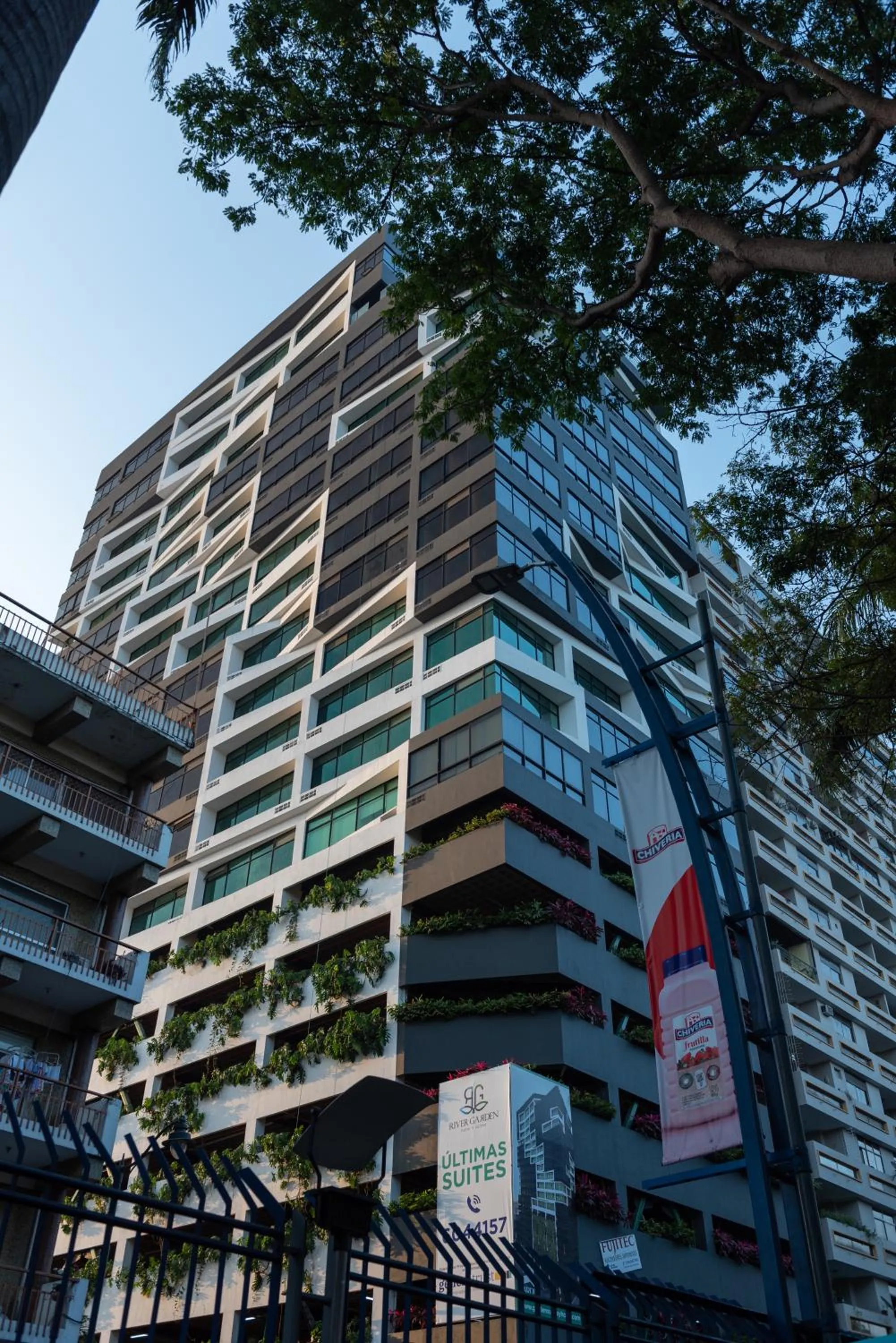 Property building in River Garden Hotel + Suites