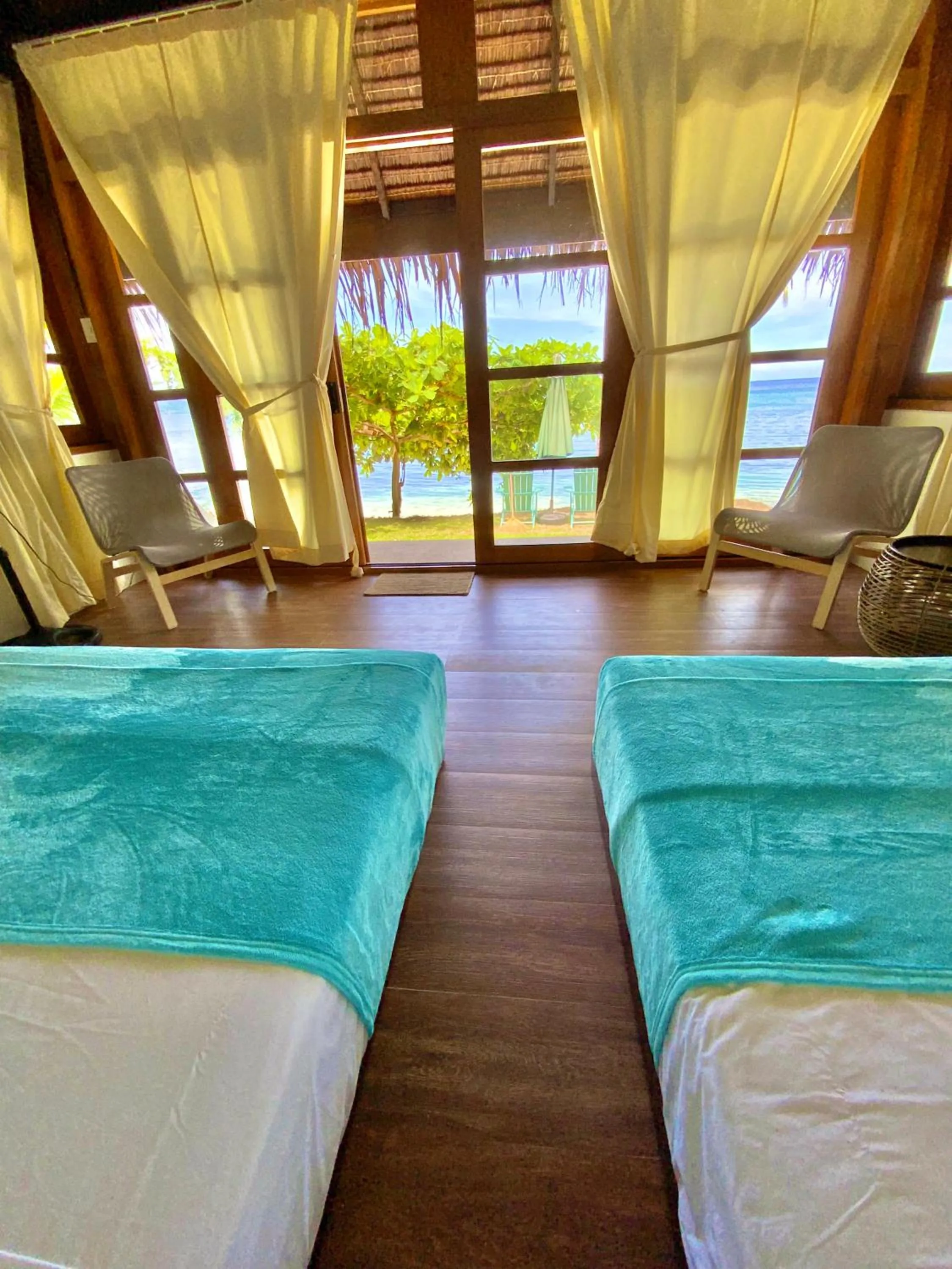 Bed in Tuburan Cove Beach Resort