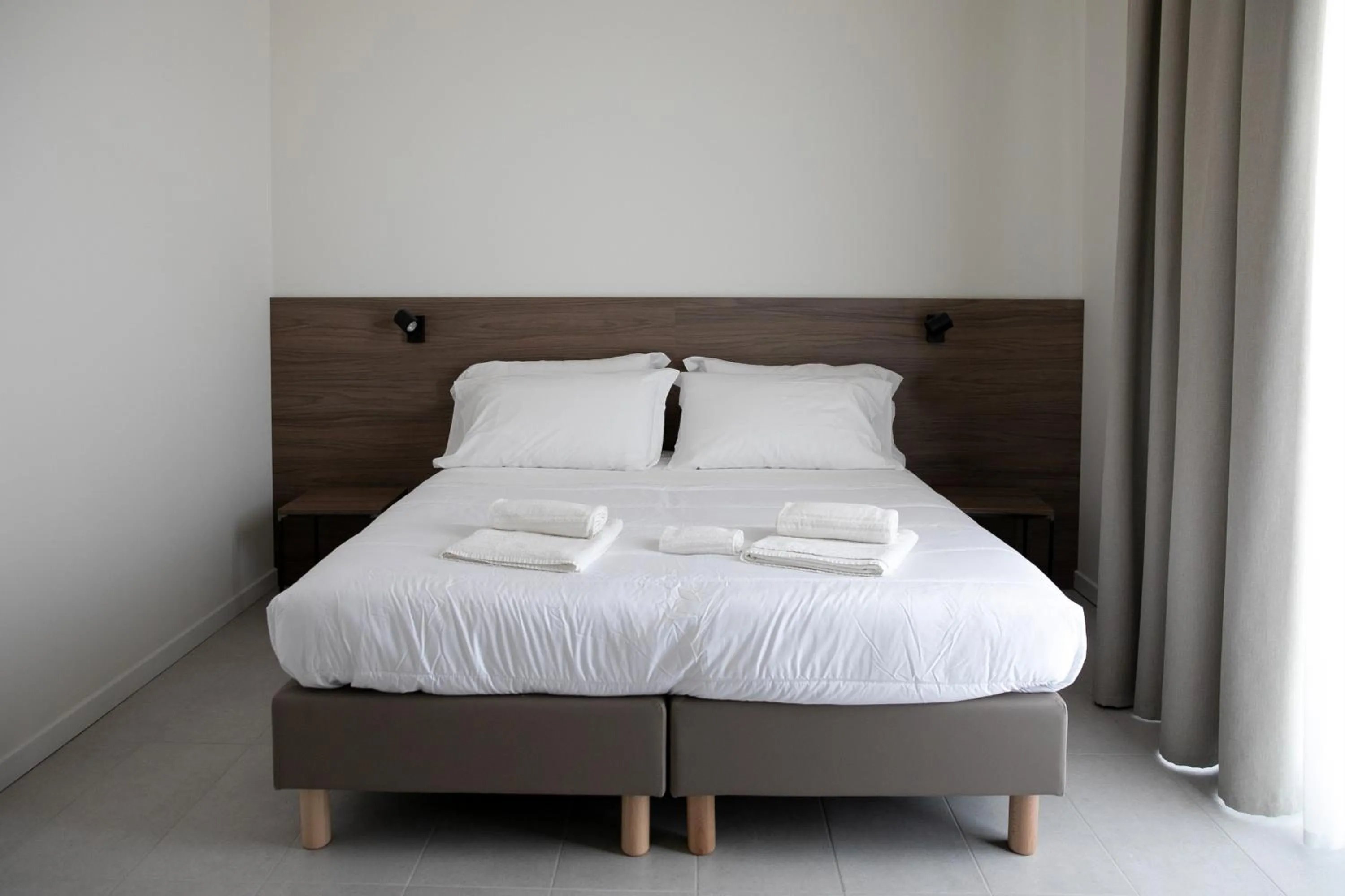 Bed in Hotel Benvenuto