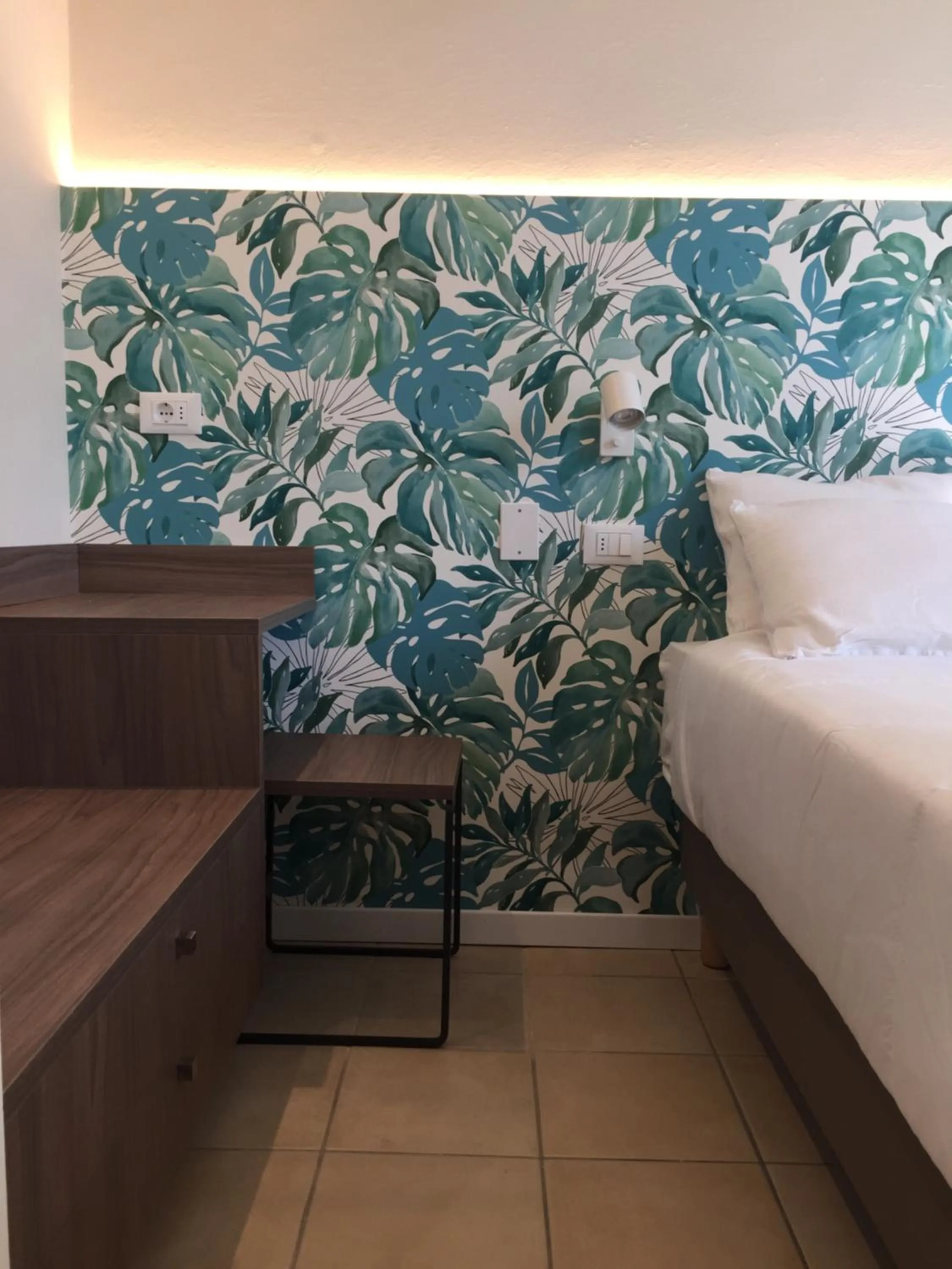 Bed in Hotel Benvenuto