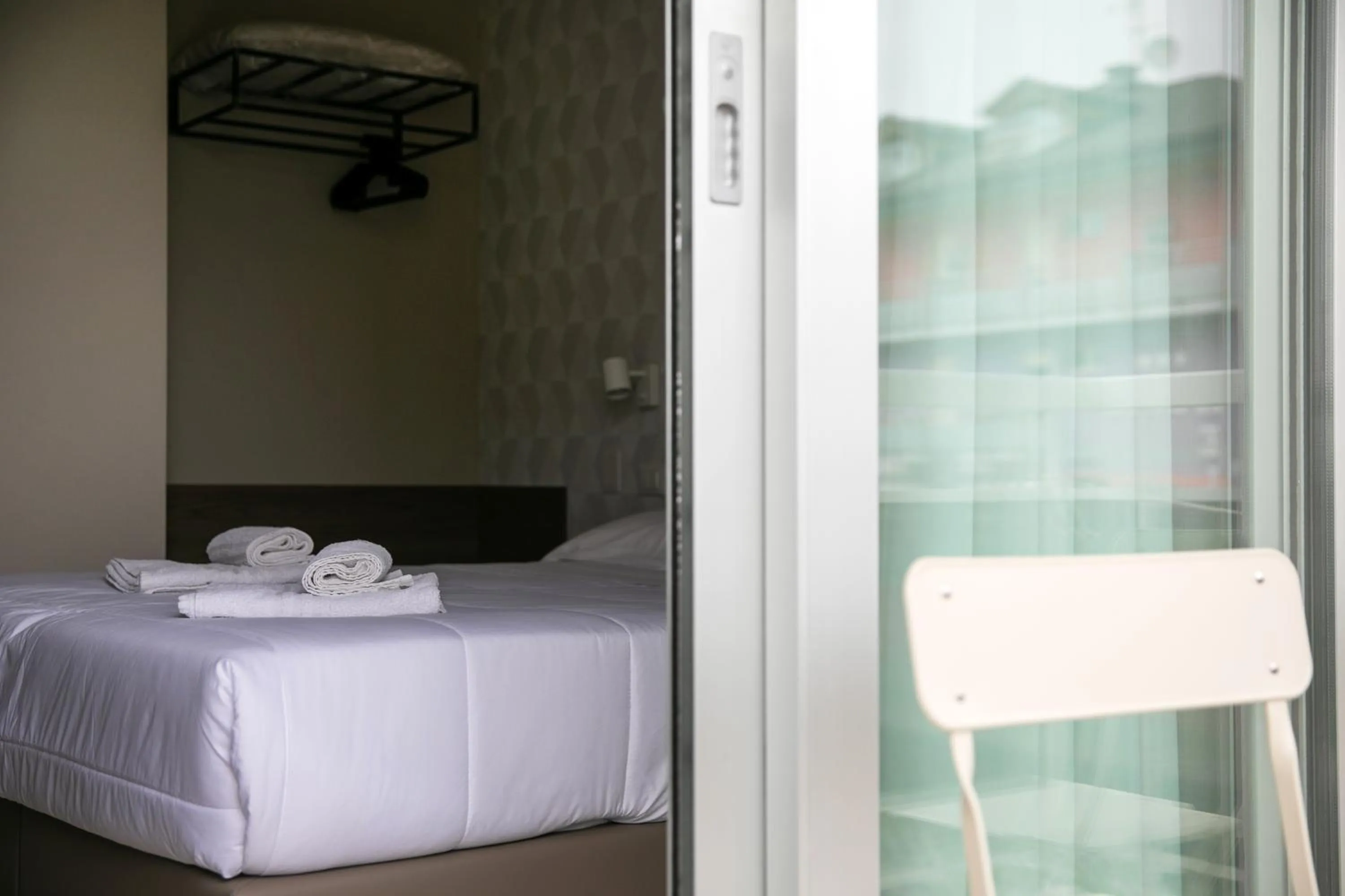 Bed in Hotel Benvenuto