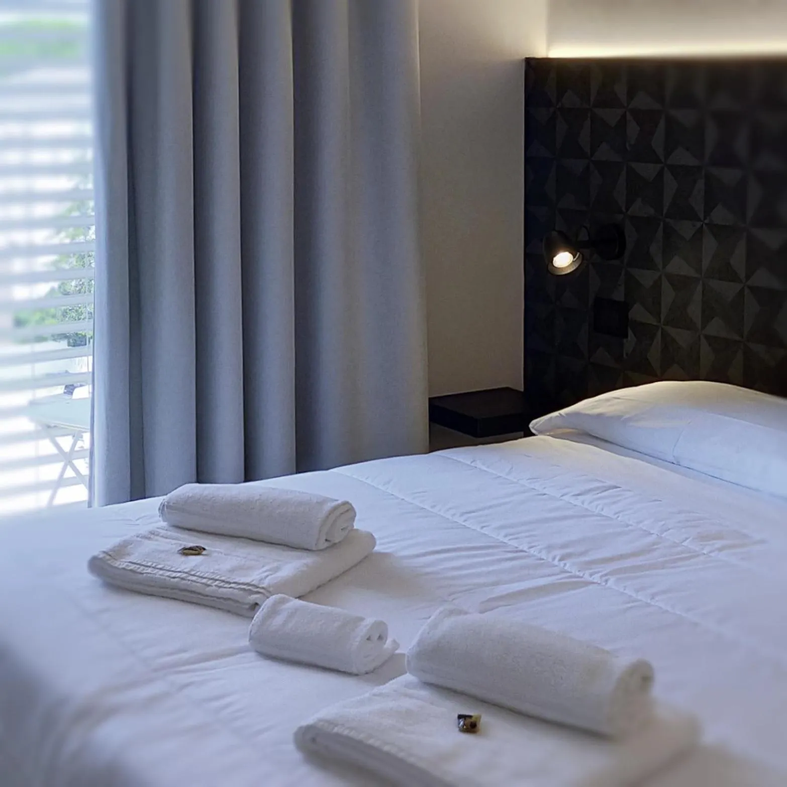 Bed in Hotel Benvenuto