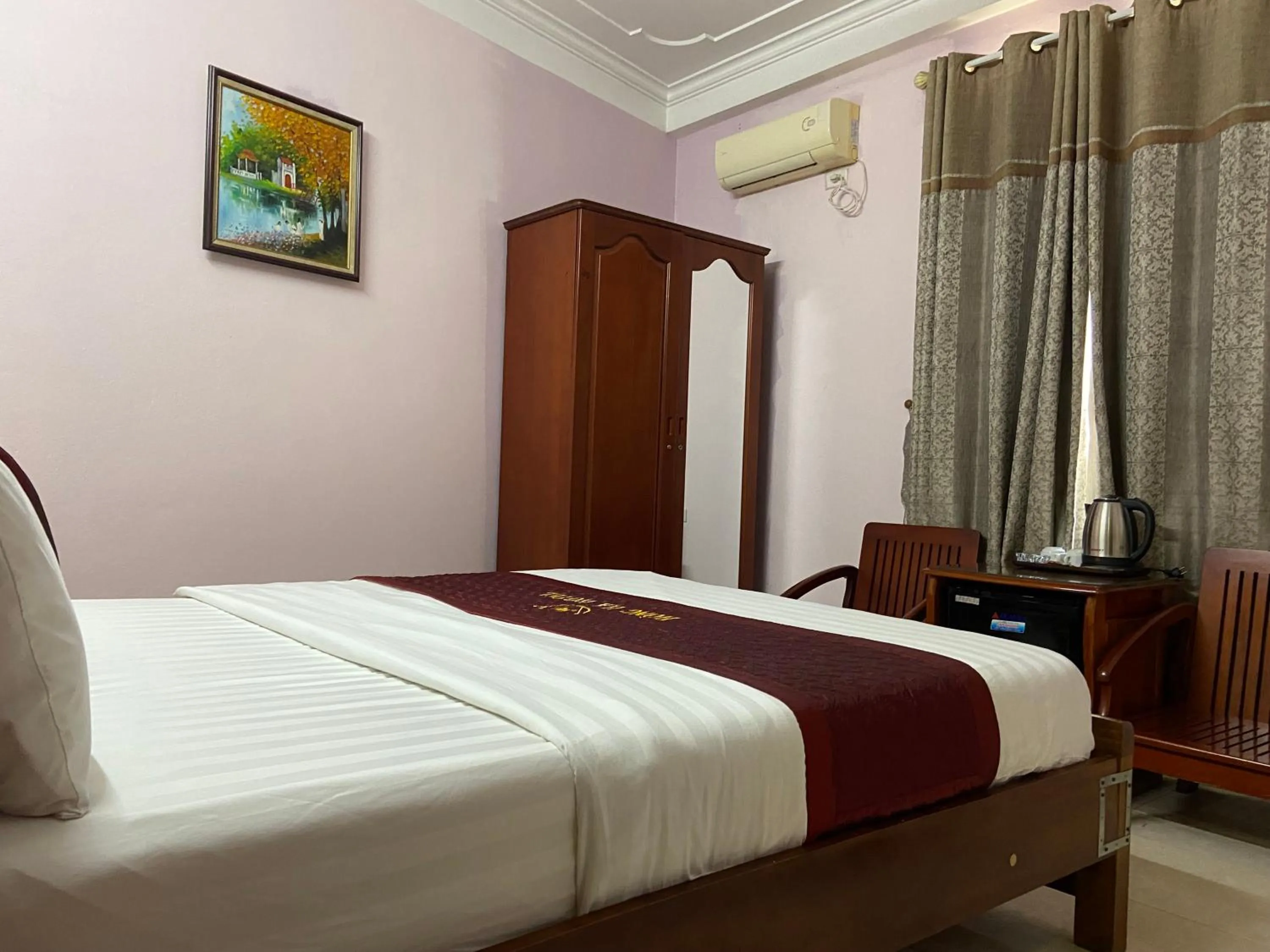 Bed in Hong Ha Airport Hotel