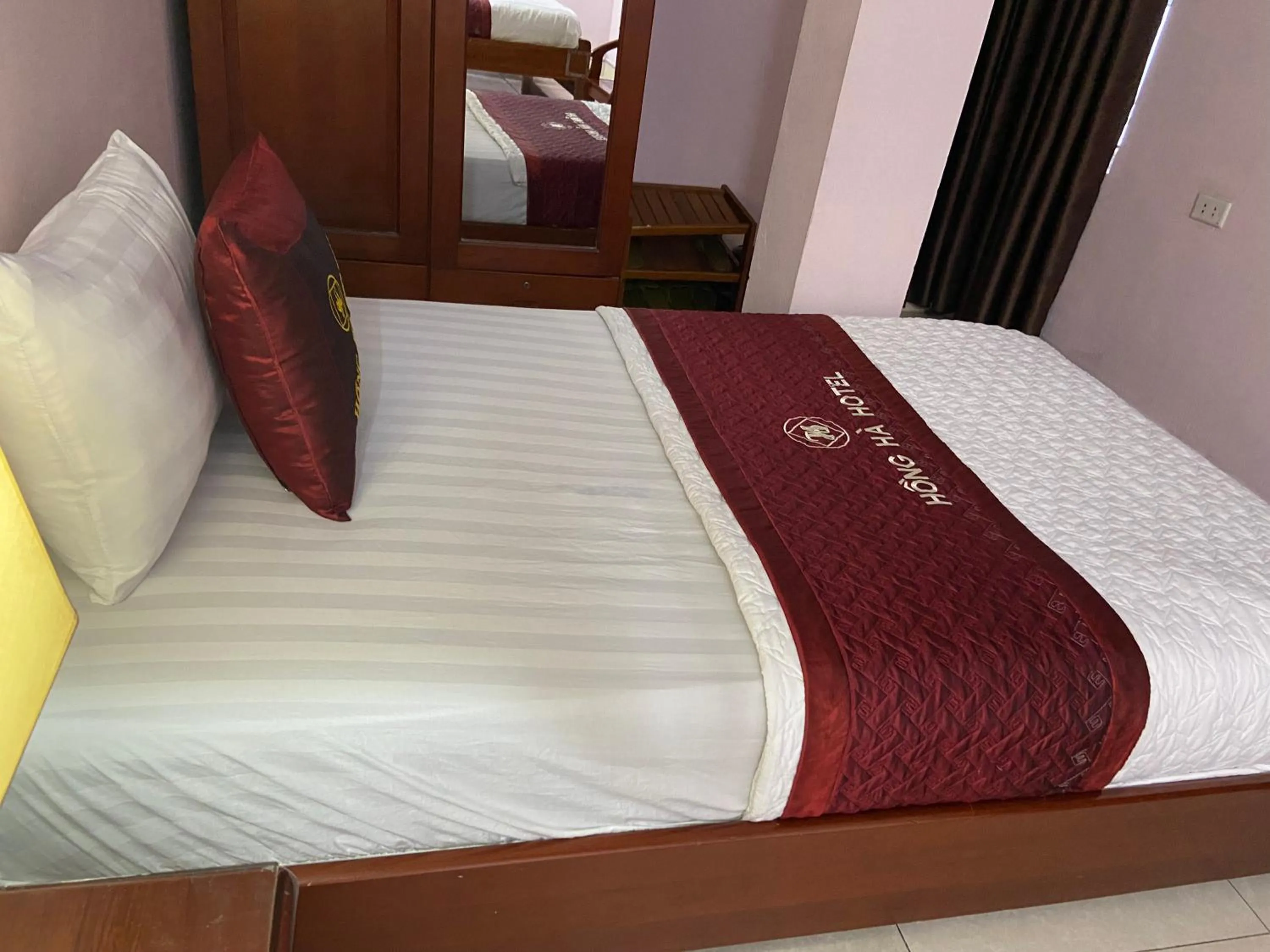 Bed in Hong Ha Airport Hotel