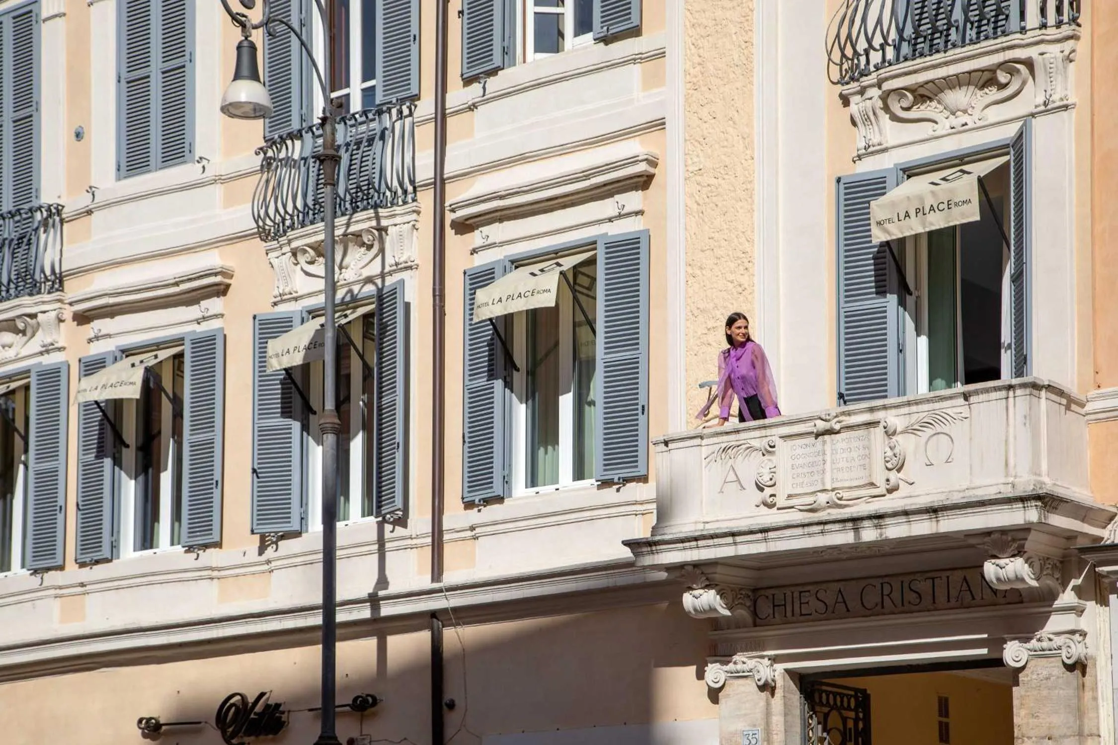 Property building in Hotel La Place Roma