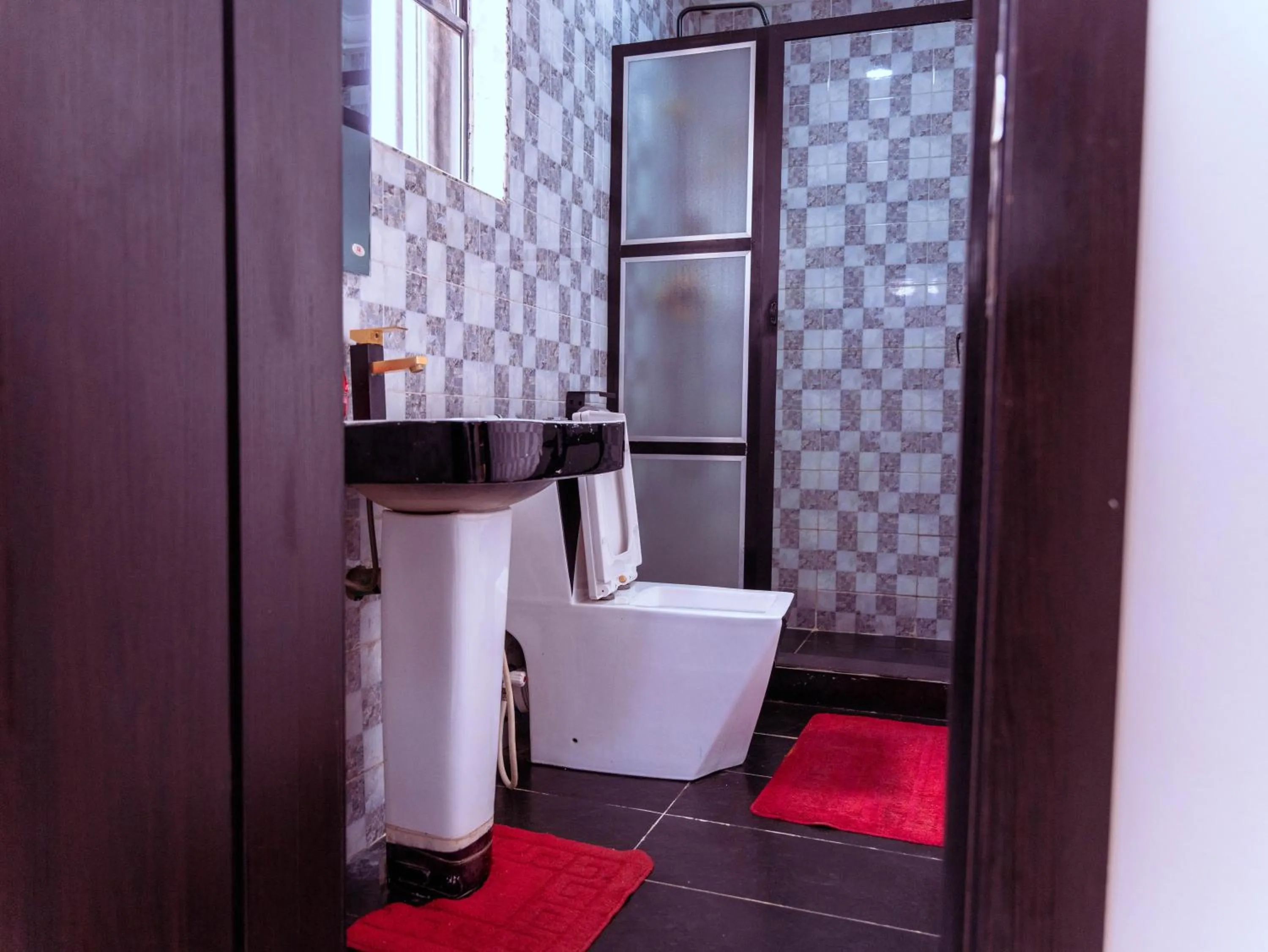 Toilet in 247 Luxury Hotel