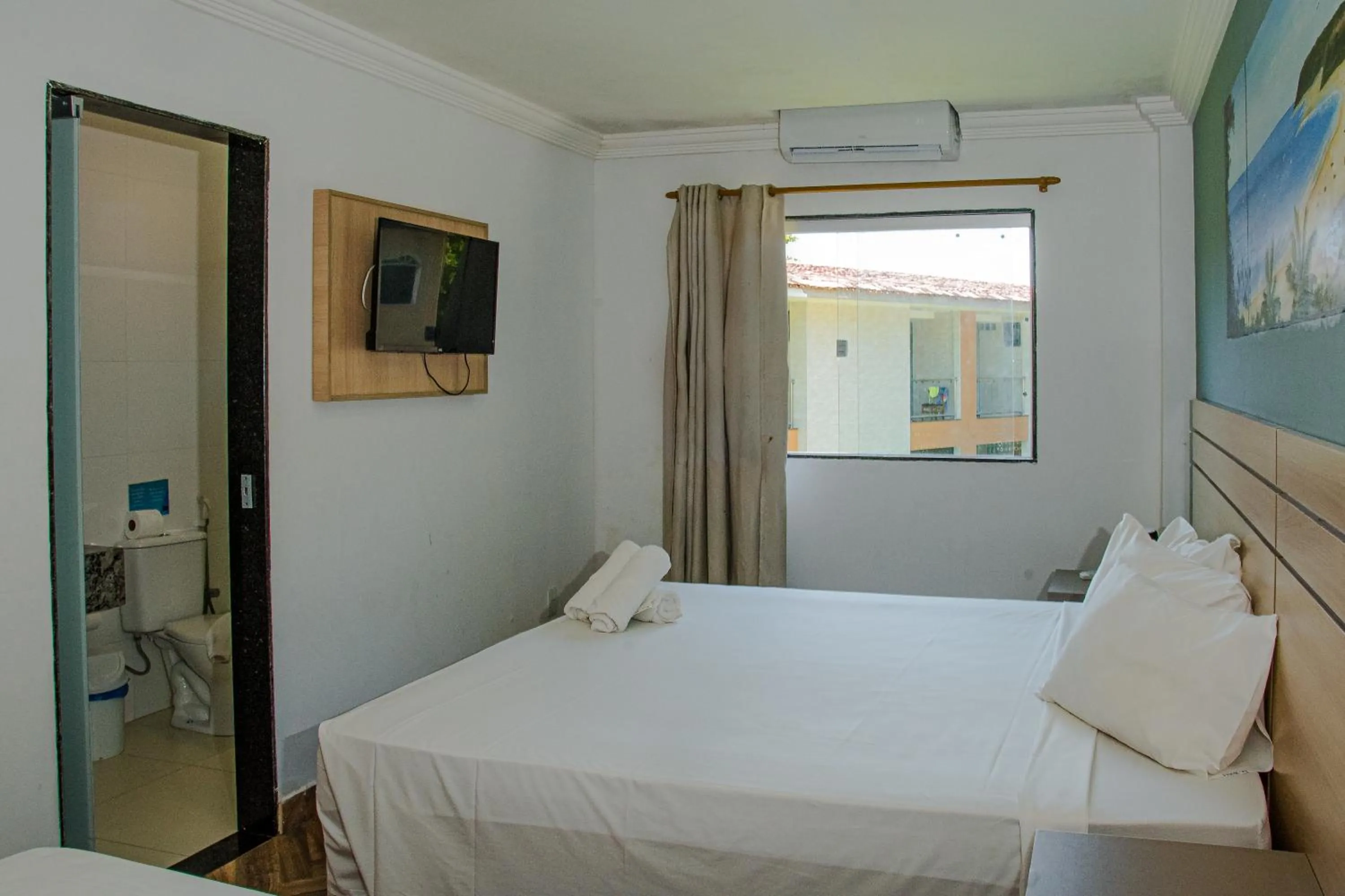 Bed in Porto Mar Hotel