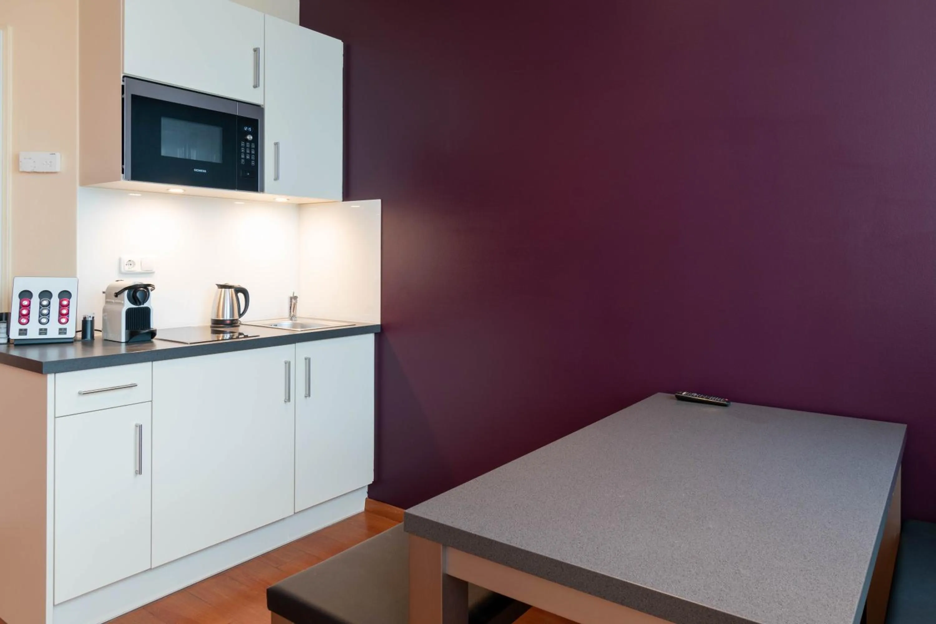 Kitchen or kitchenette in Star G Hotel München Schwabing