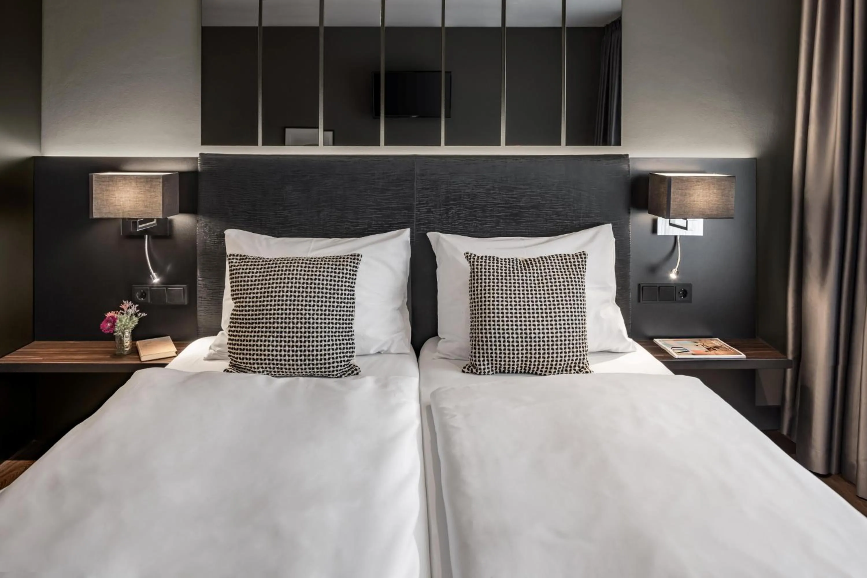 Bed in Hotel AMANO Düsseldorf