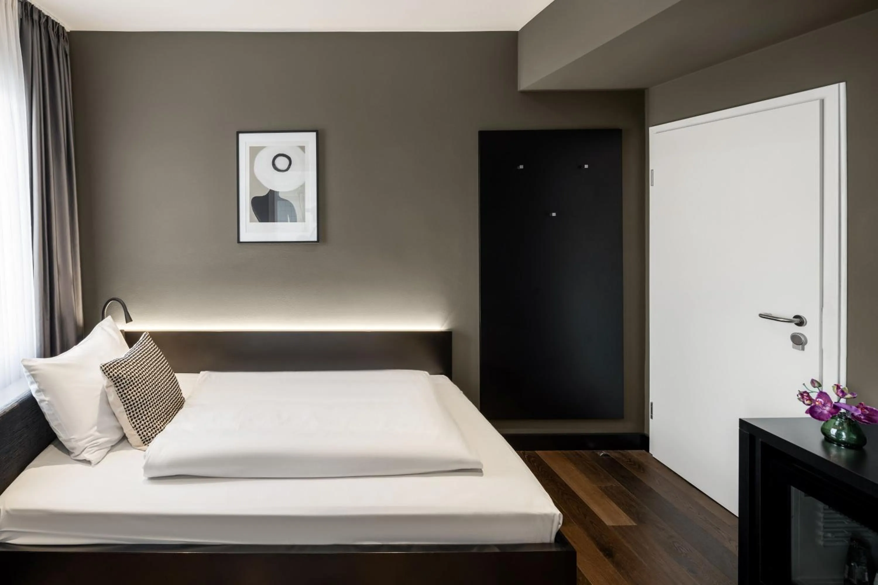 Bed in Hotel AMANO Düsseldorf