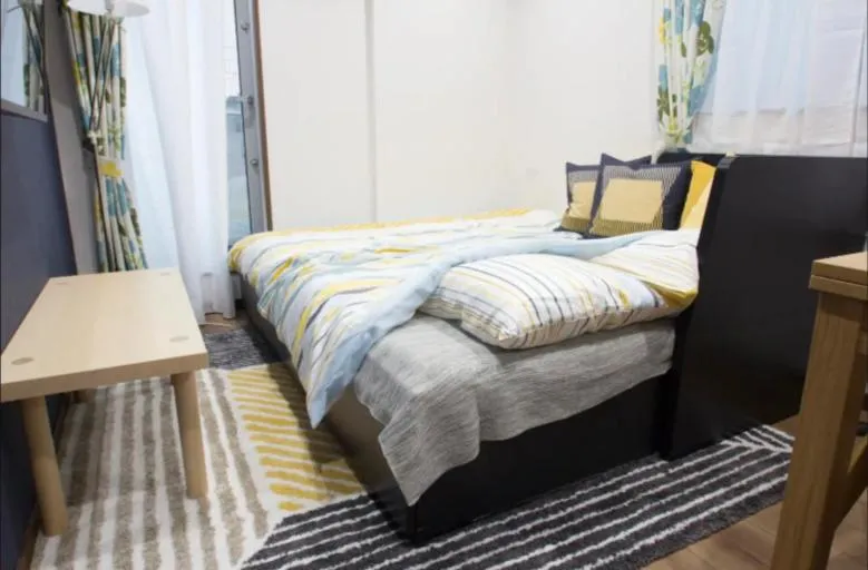 Bed in Crescent Moon Nakanoshimbashi