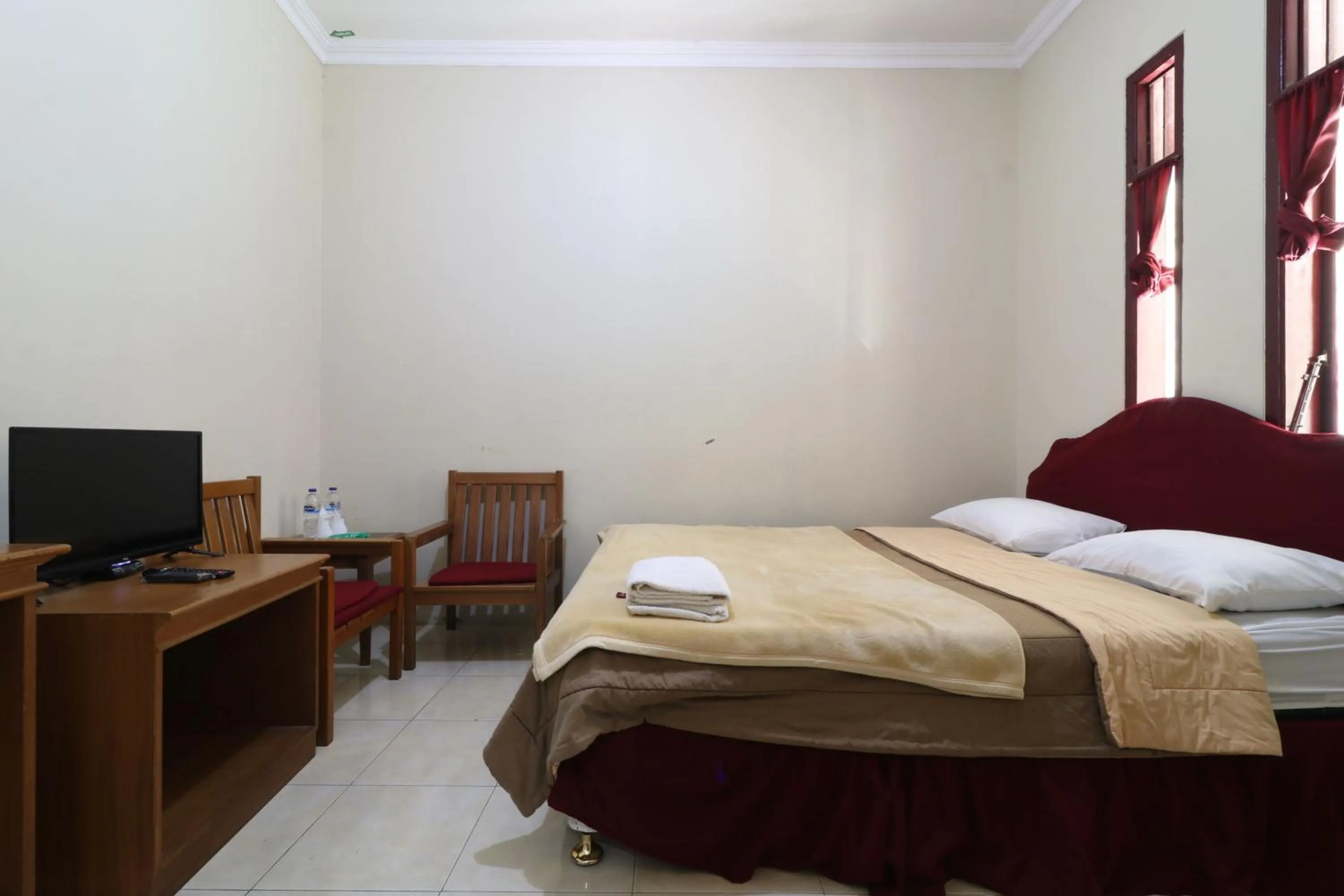 Bed in Kampung Pa'go Resort Hotel