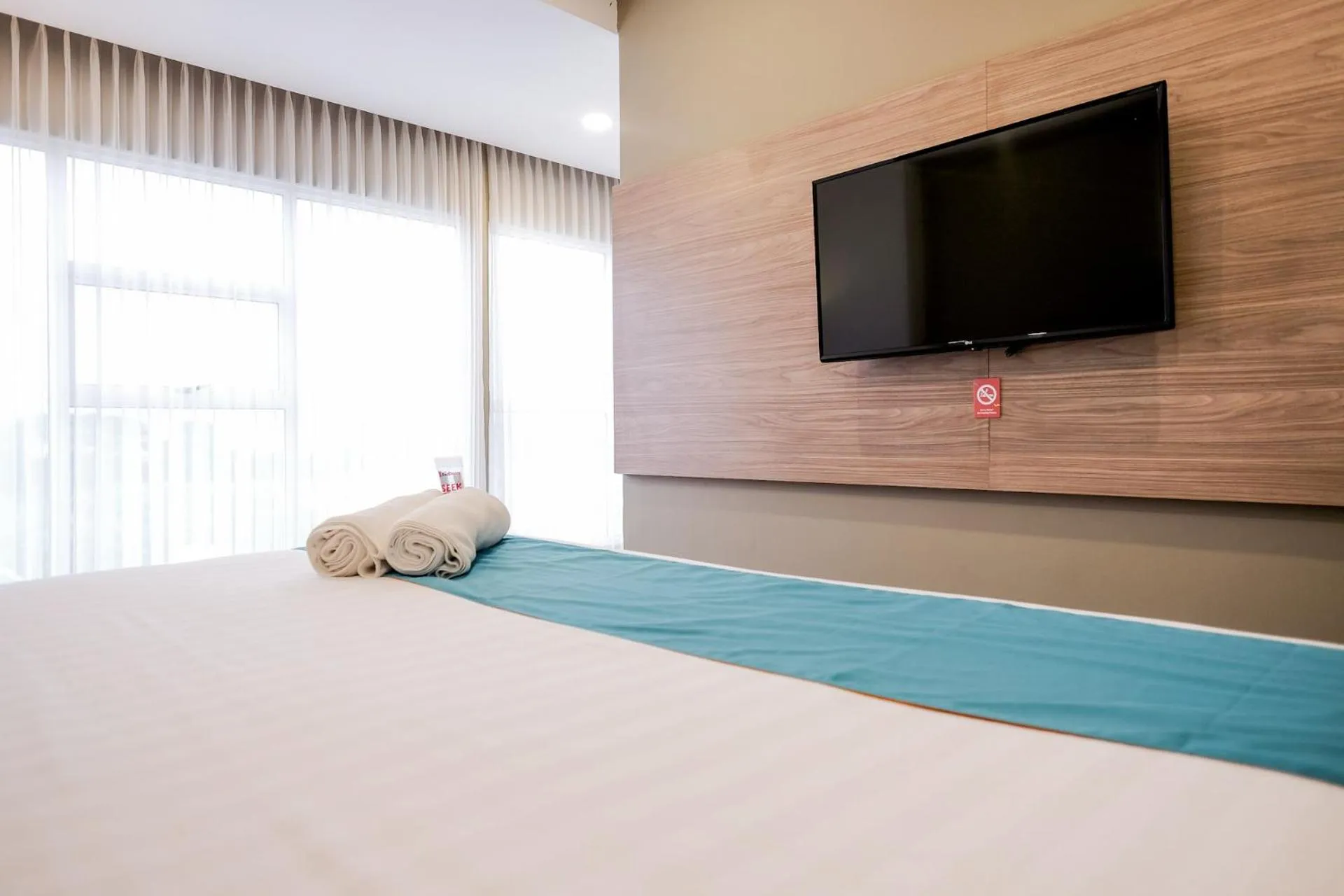 Bedroom, Bed in Sans Hotel Puri Indah Jakarta