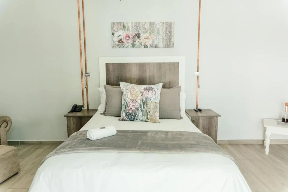 Bed in The Perfect Corner Guesthouse