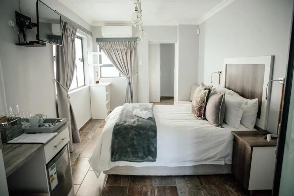 Bed in The Perfect Corner Guesthouse