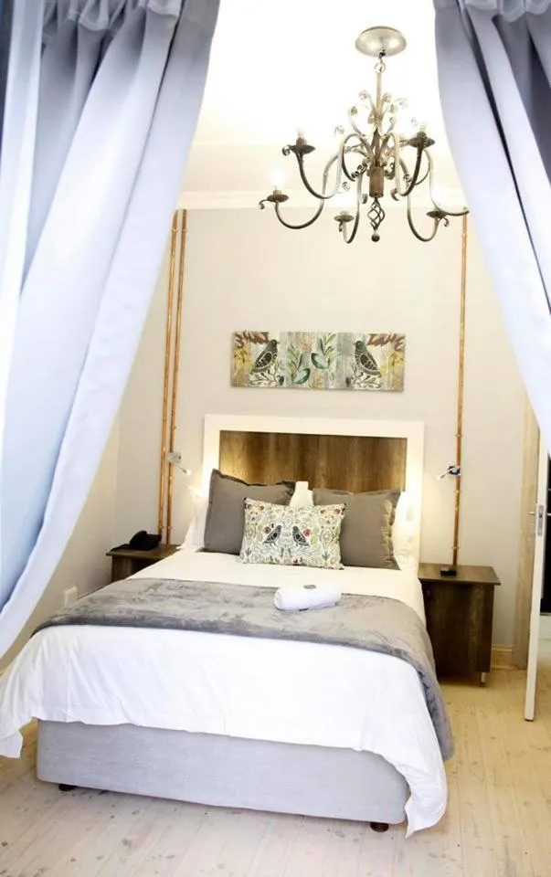 Bed in The Perfect Corner Guesthouse