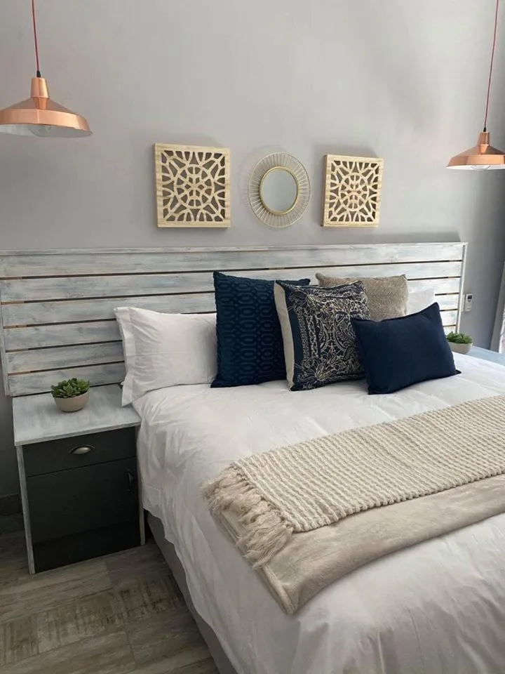 Bed in The Perfect Corner Guesthouse