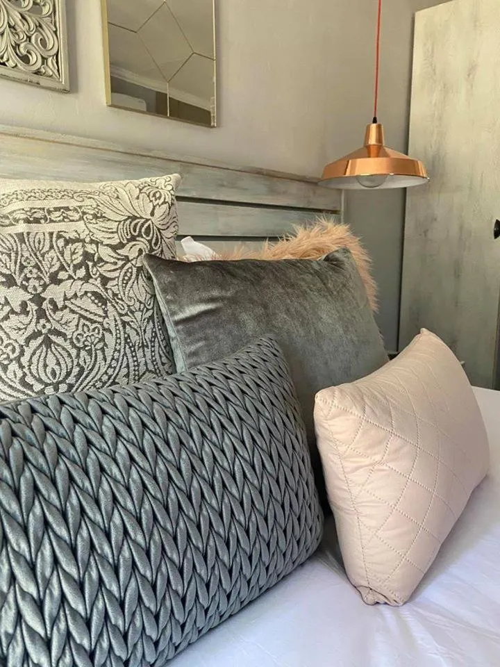 Bed in The Perfect Corner Guesthouse