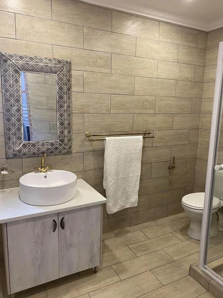 Shower in The Perfect Corner Guesthouse