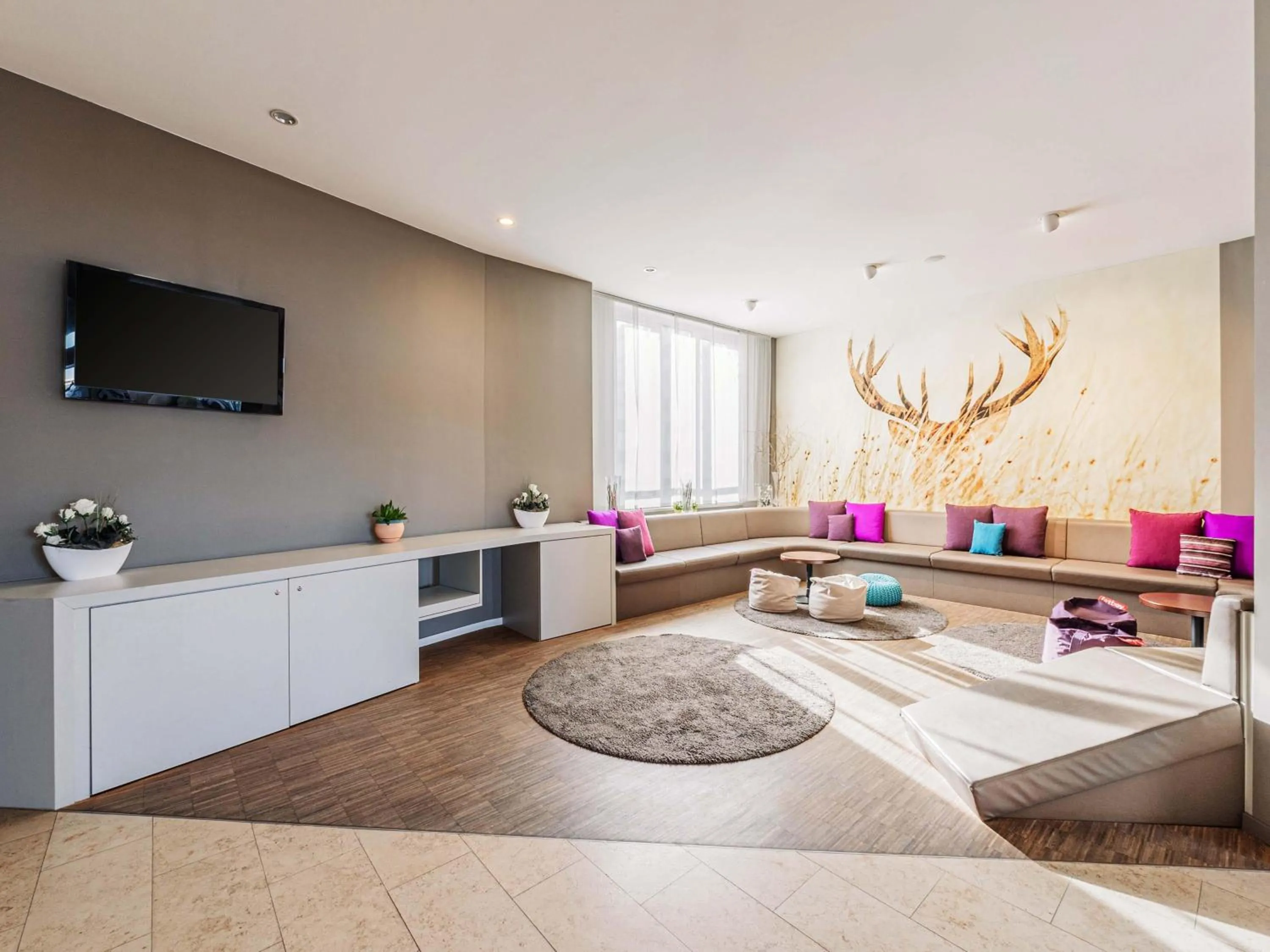 Lobby or reception in B&B HOTEL Rastatt