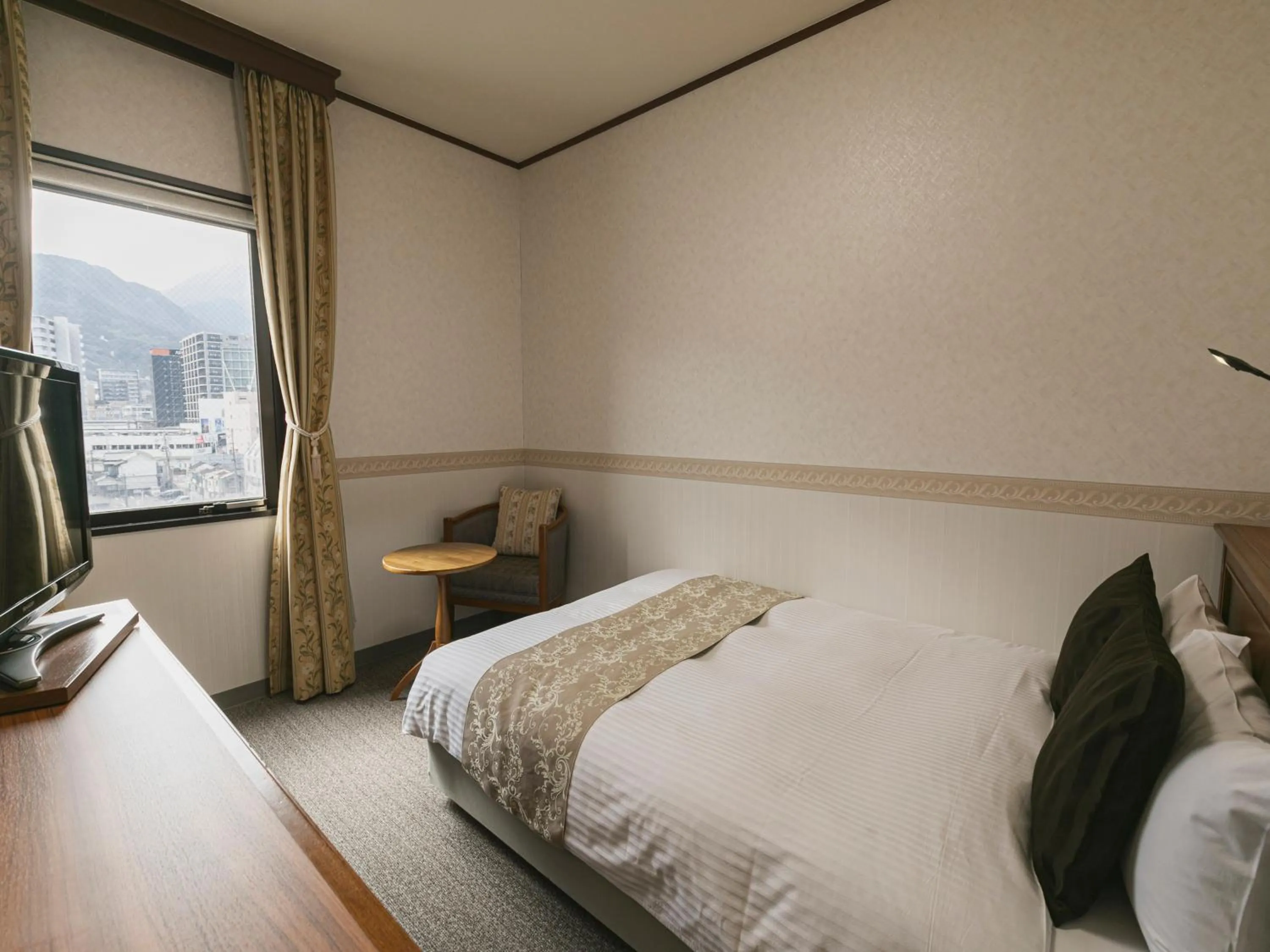 Bed in Hotel Arthur KITAHAMA BASE