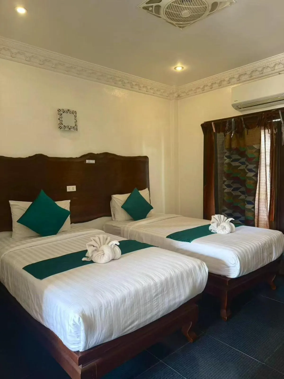 Bed in Alana Luang Prabang