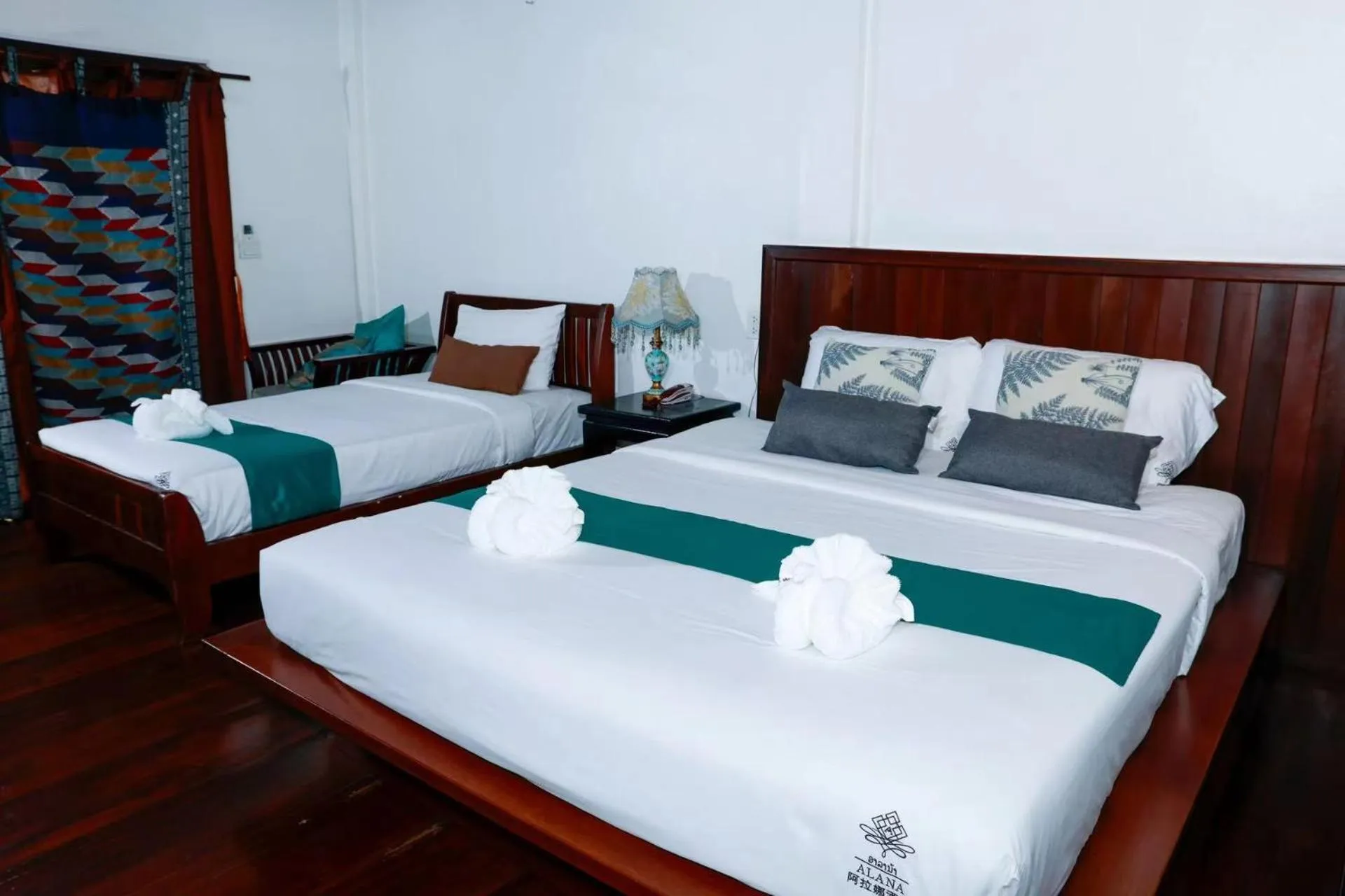 Bed in Alana Luang Prabang