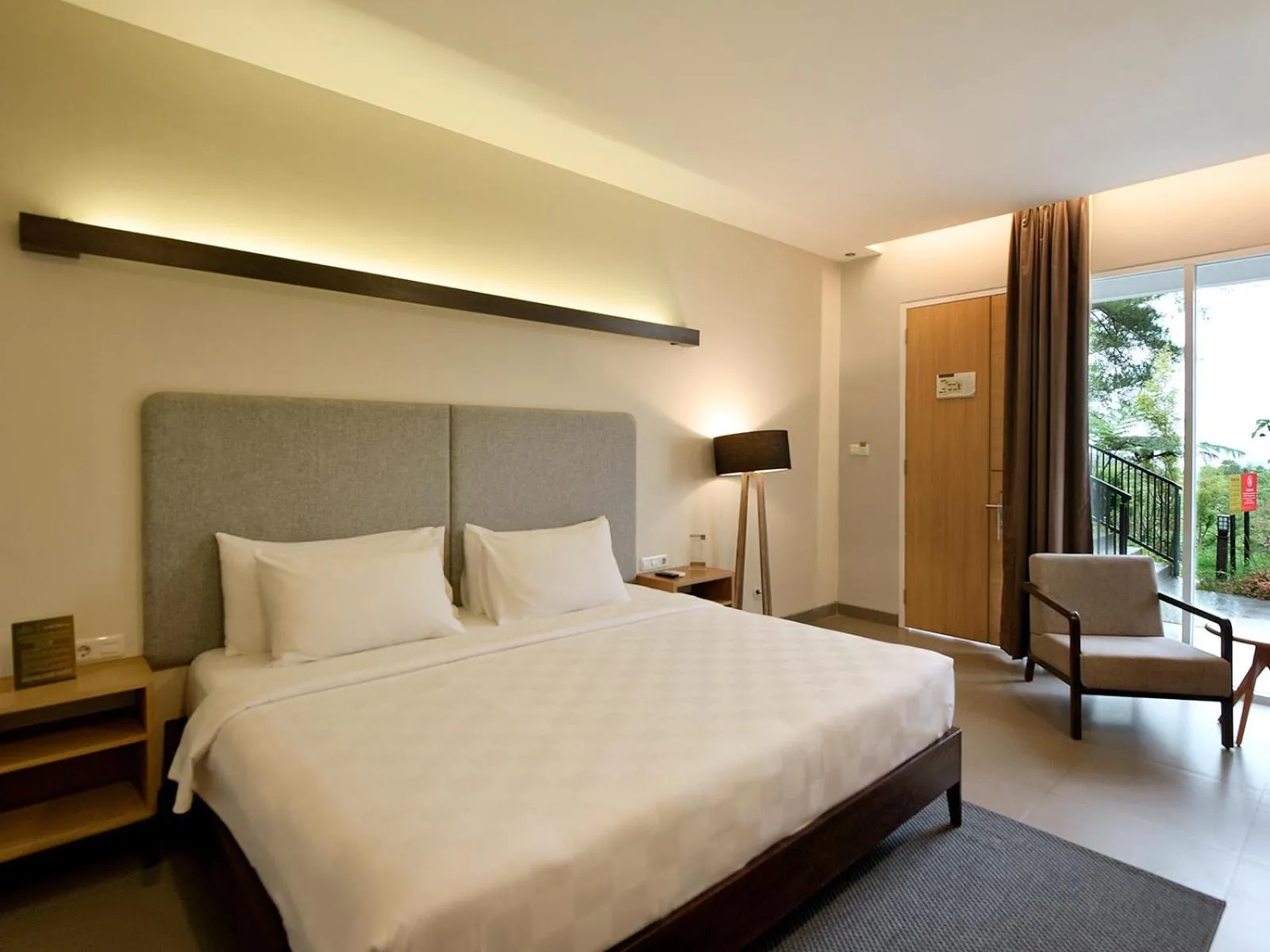 Bed in The Balcone Suites & Resort