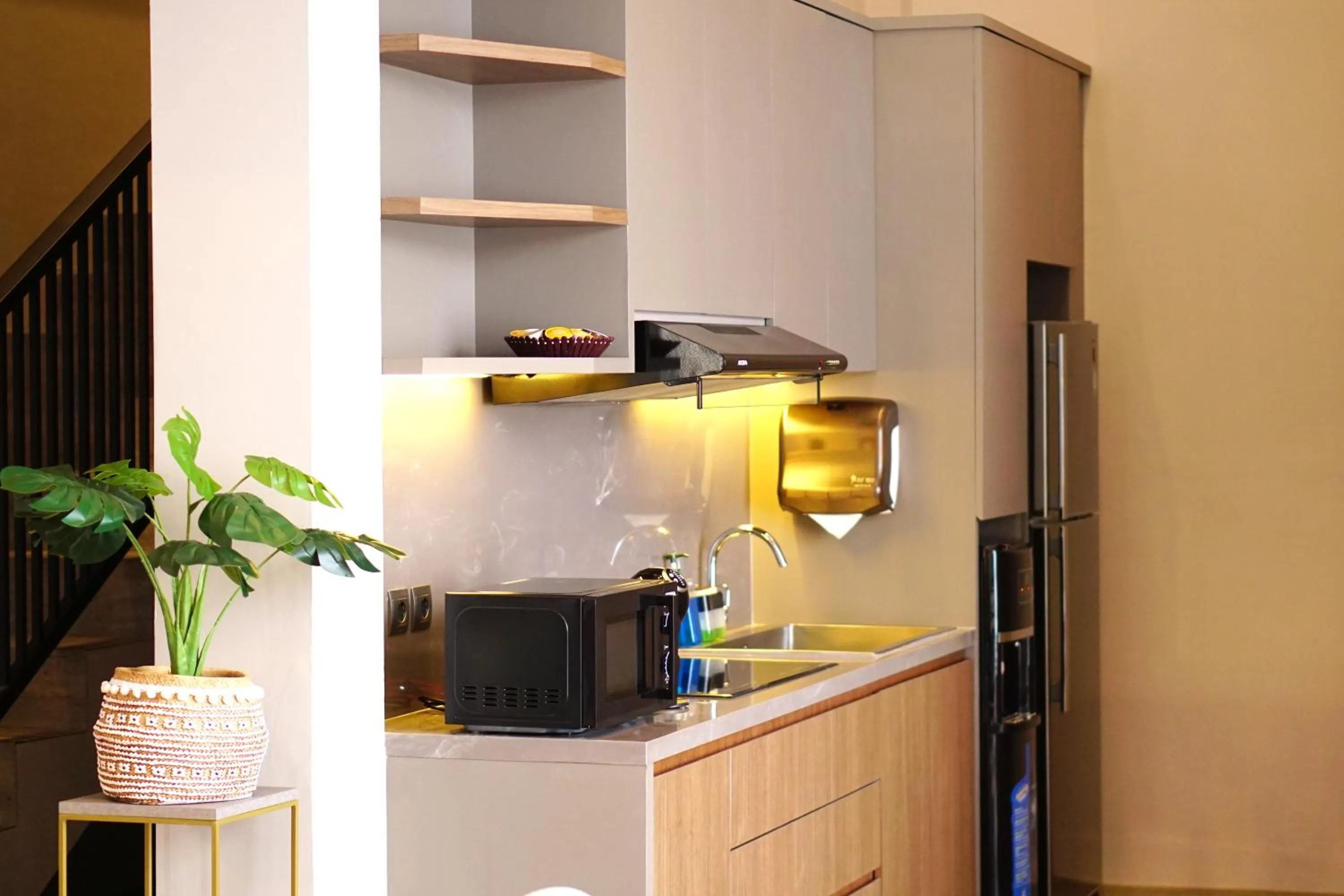Kitchen or kitchenette in The Balcone Suites & Resort