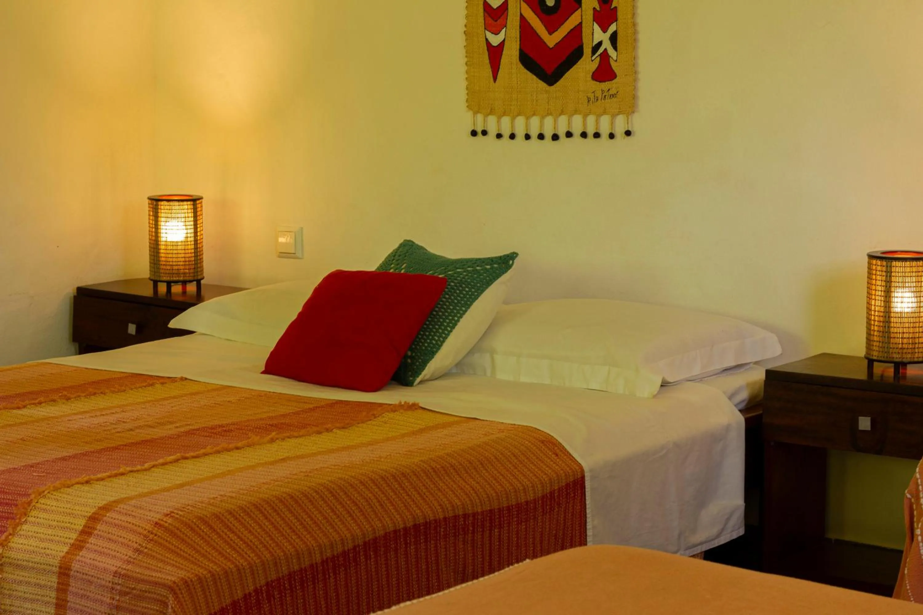 Bed in Pousada Aquarela