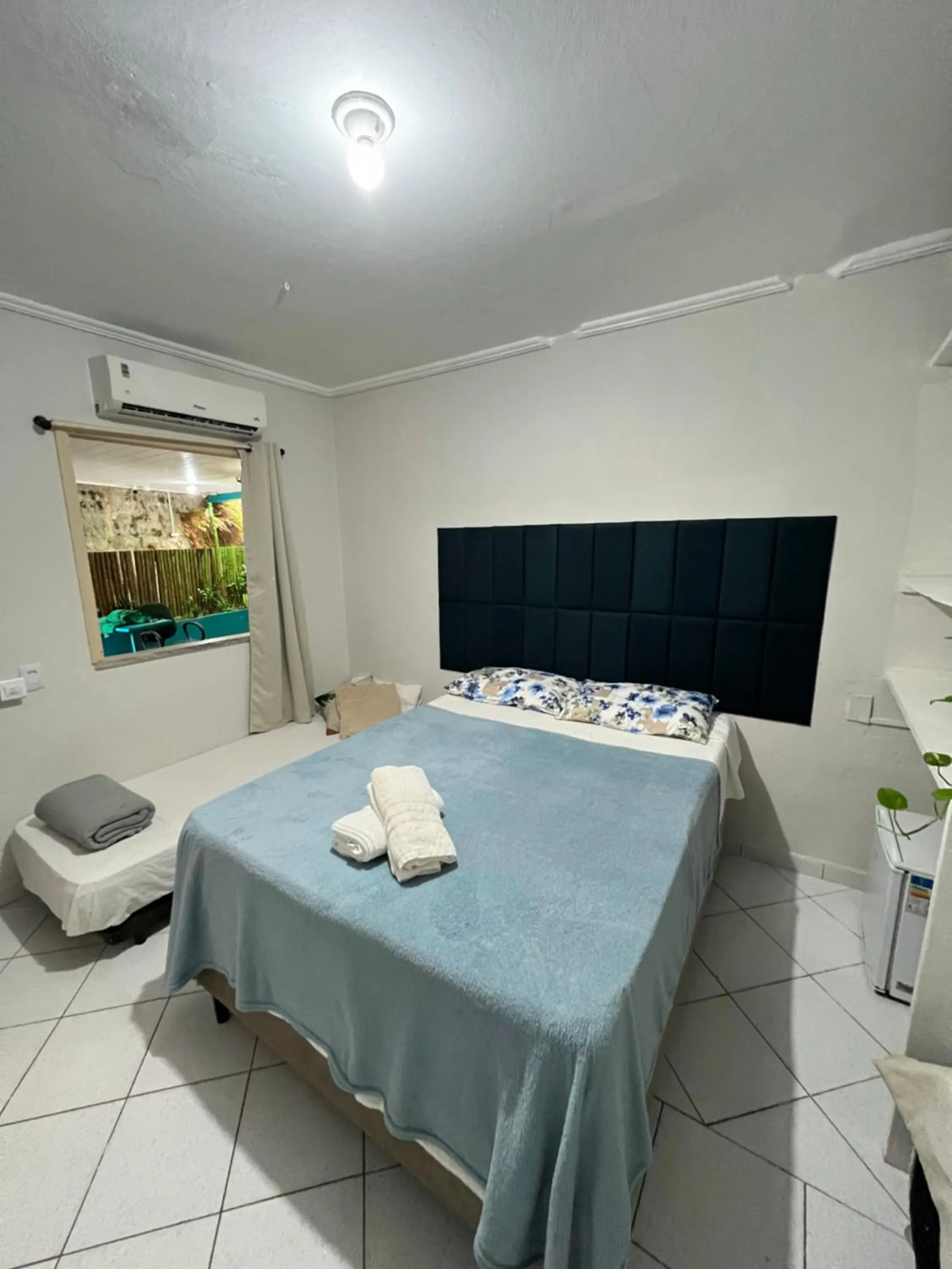 Bed in Pousada Nativo