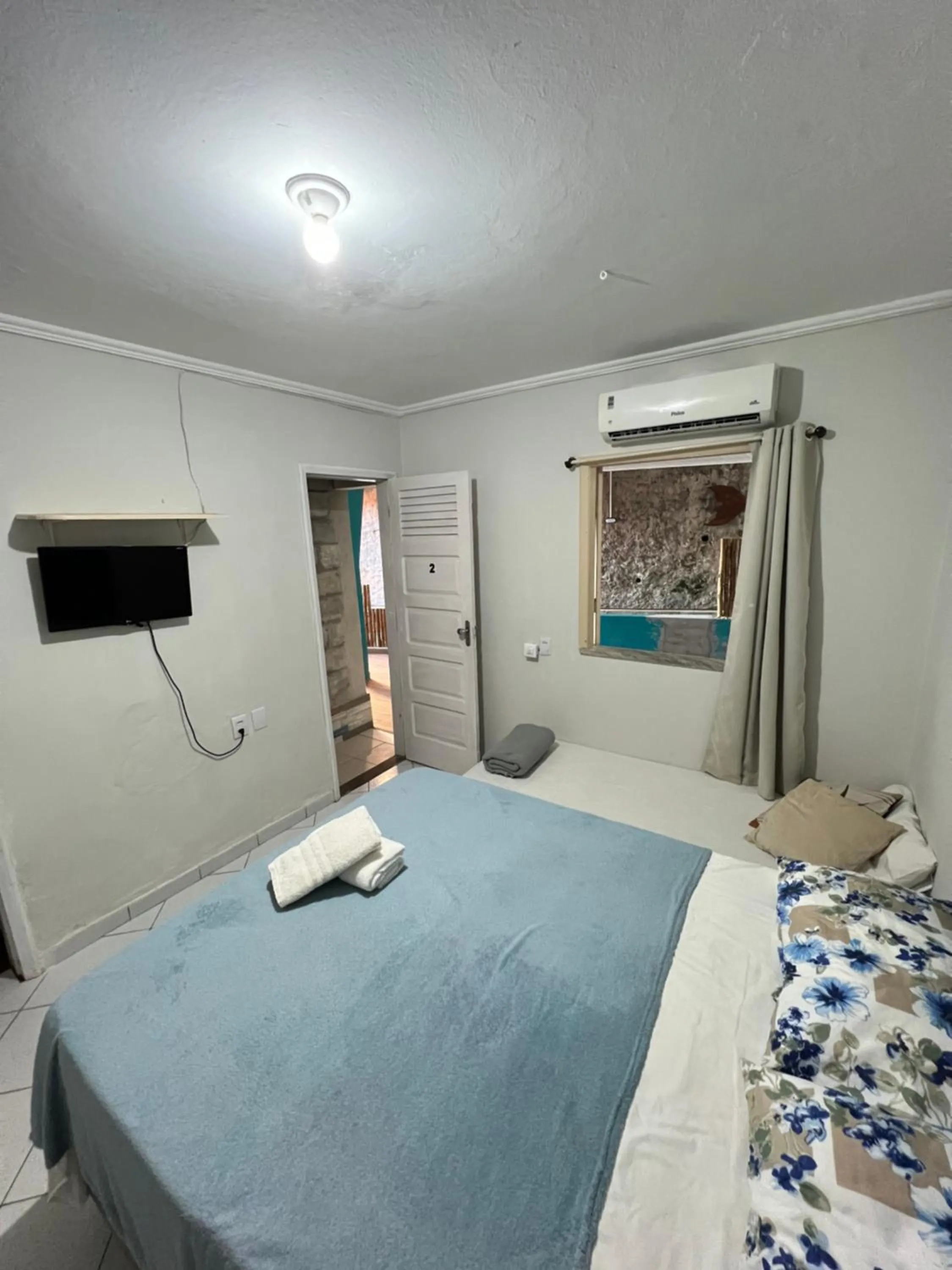 Bed in Pousada Nativo