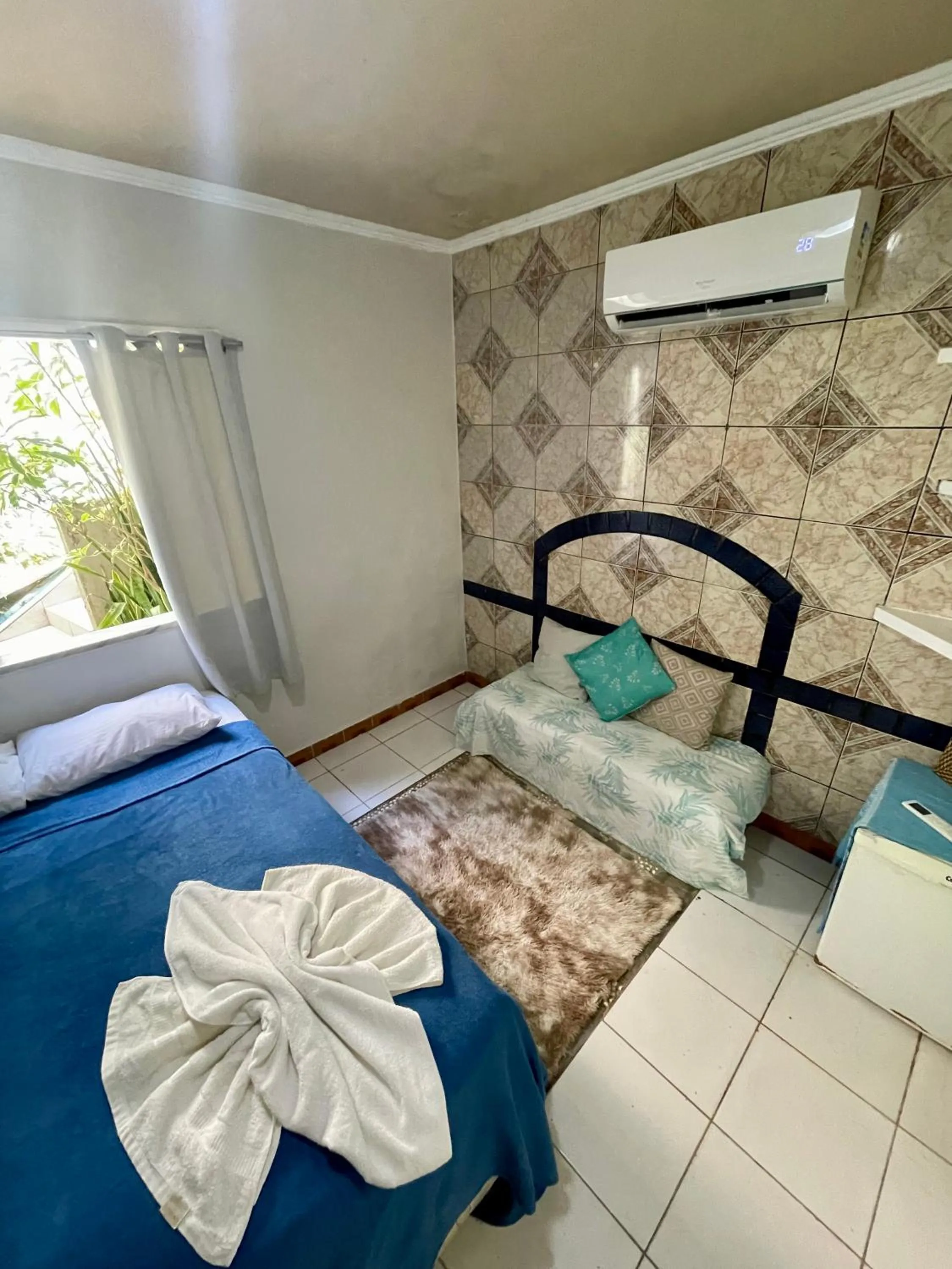 Bed in Pousada Nativo