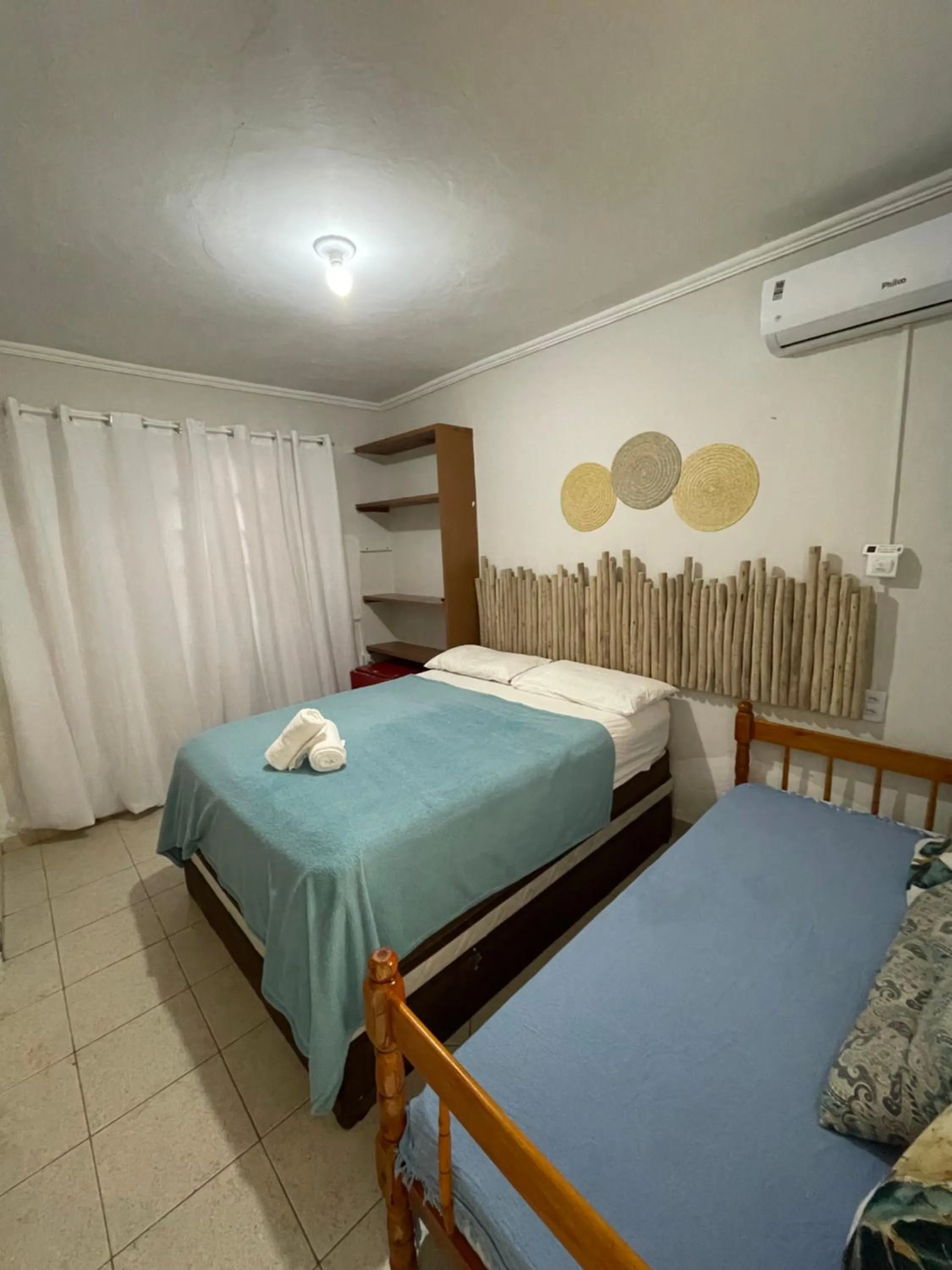 Bed in Pousada Nativo