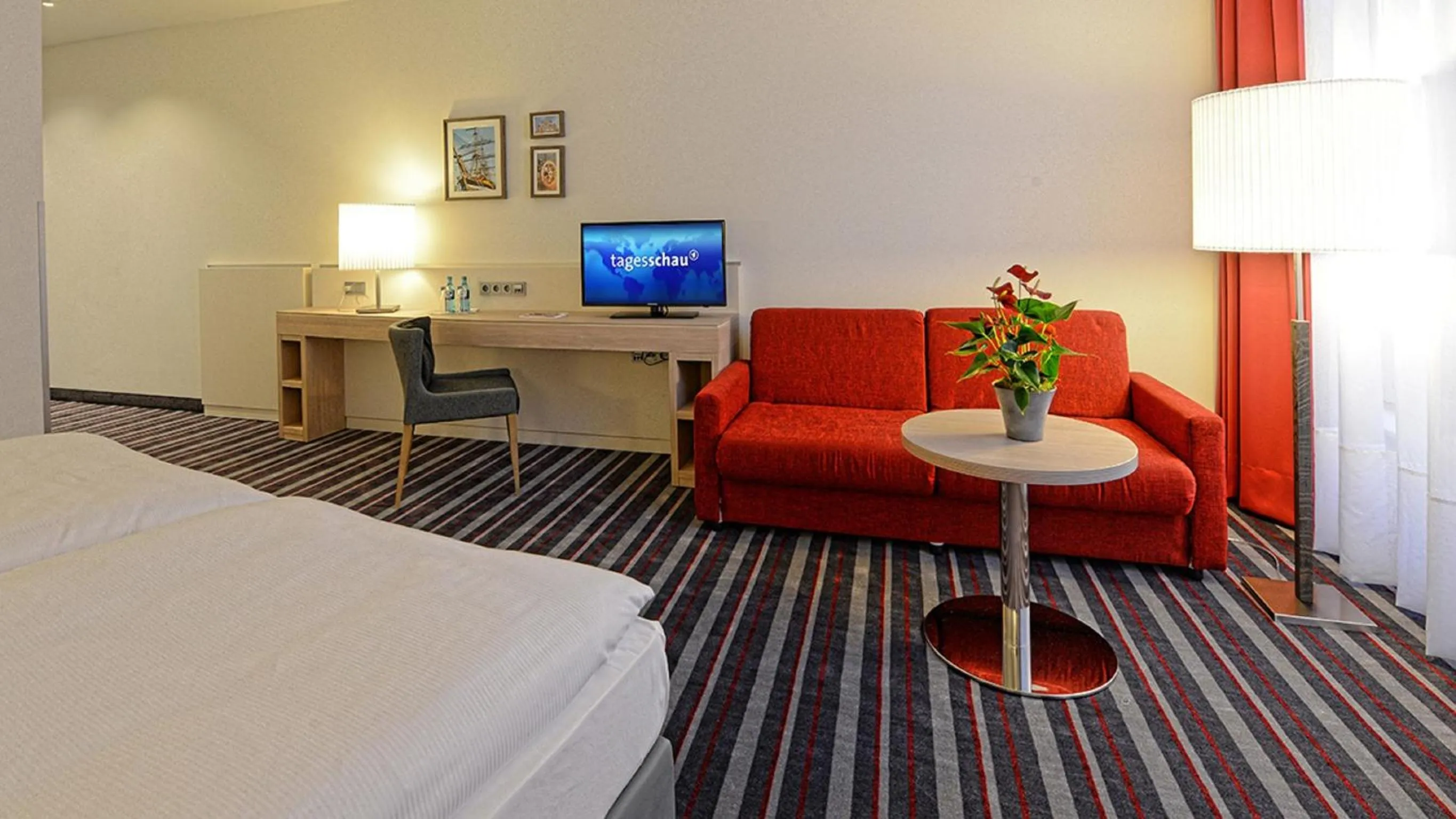 Photo of the whole room, Bed in H+ Hotel Stade Herzog Widukind